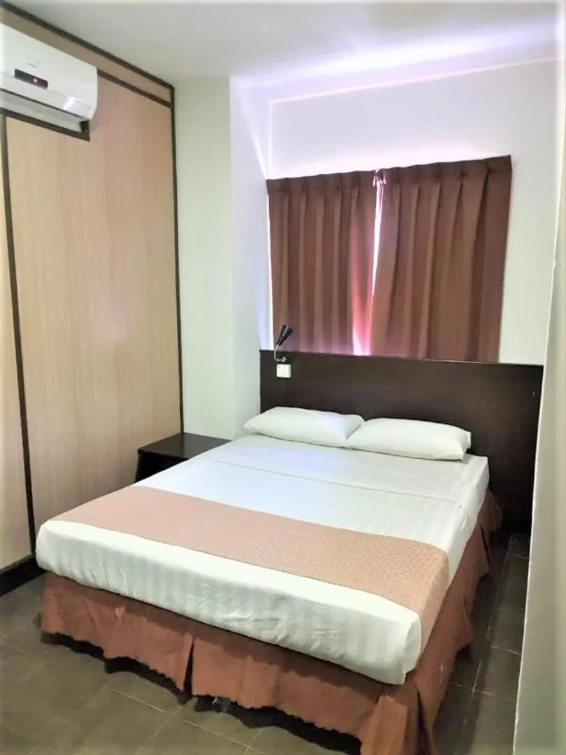 Bed in Sipadan Inn 1