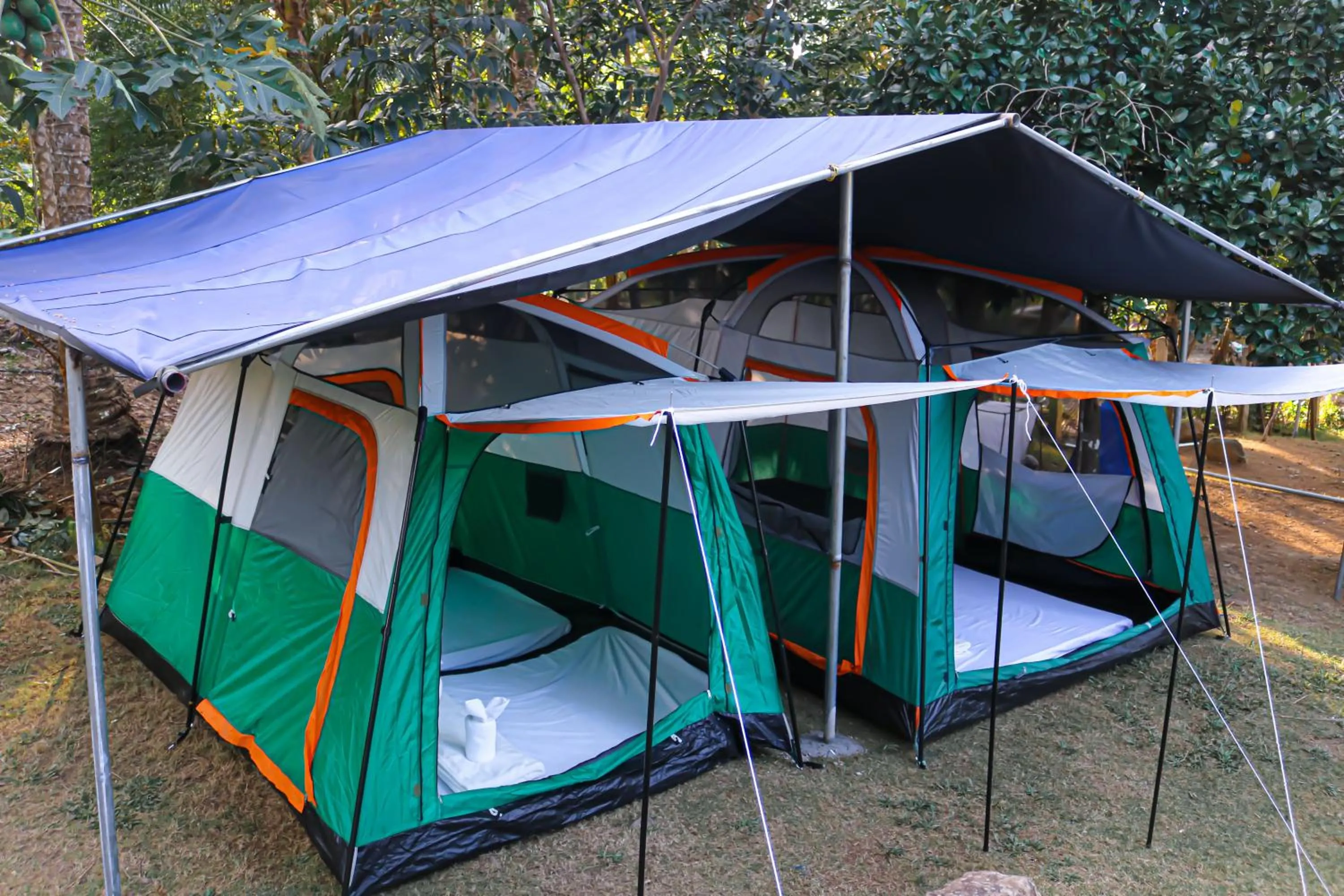 Bed in Camp Paraiso Resort