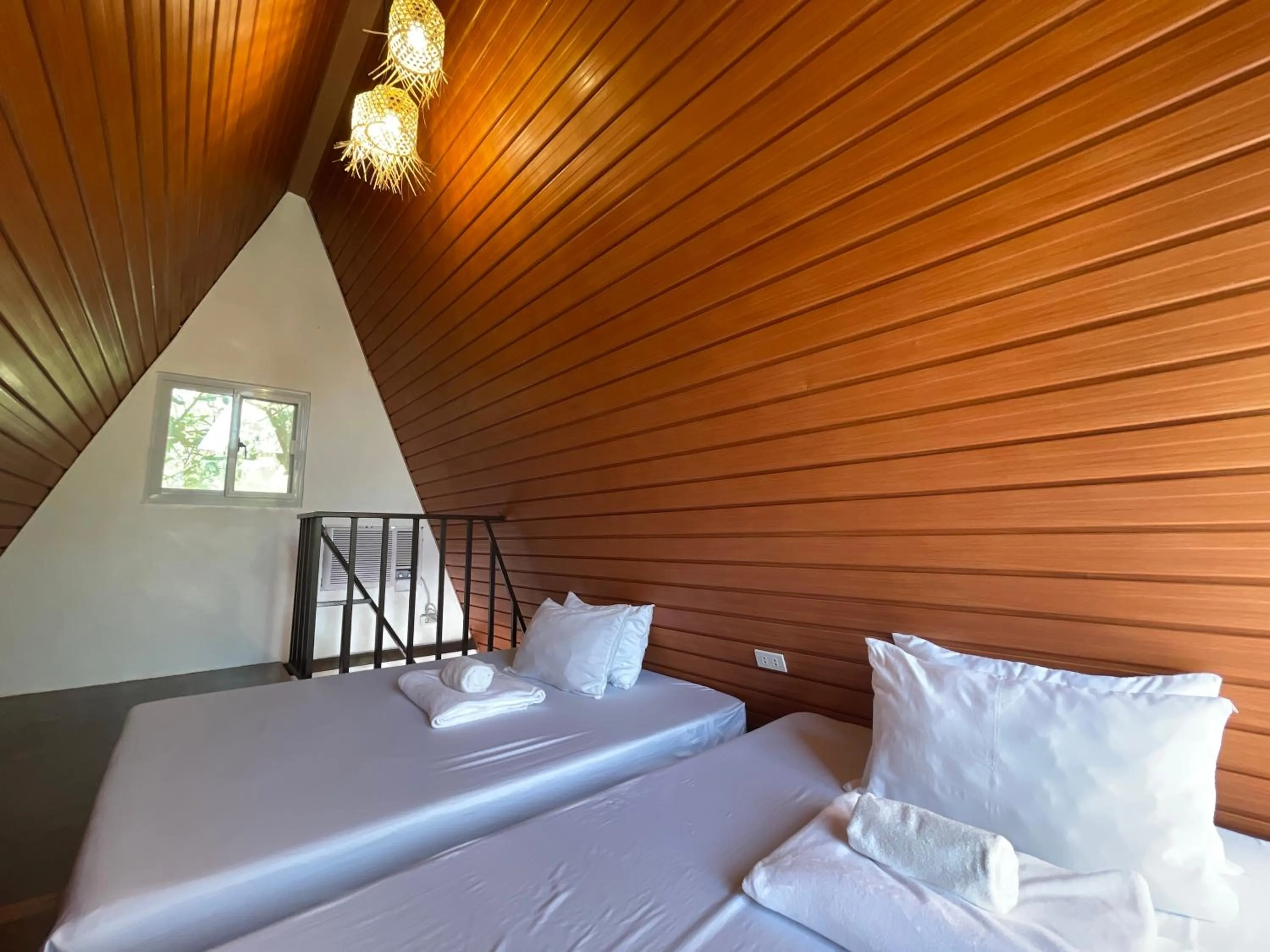 Bed in Camp Paraiso Resort