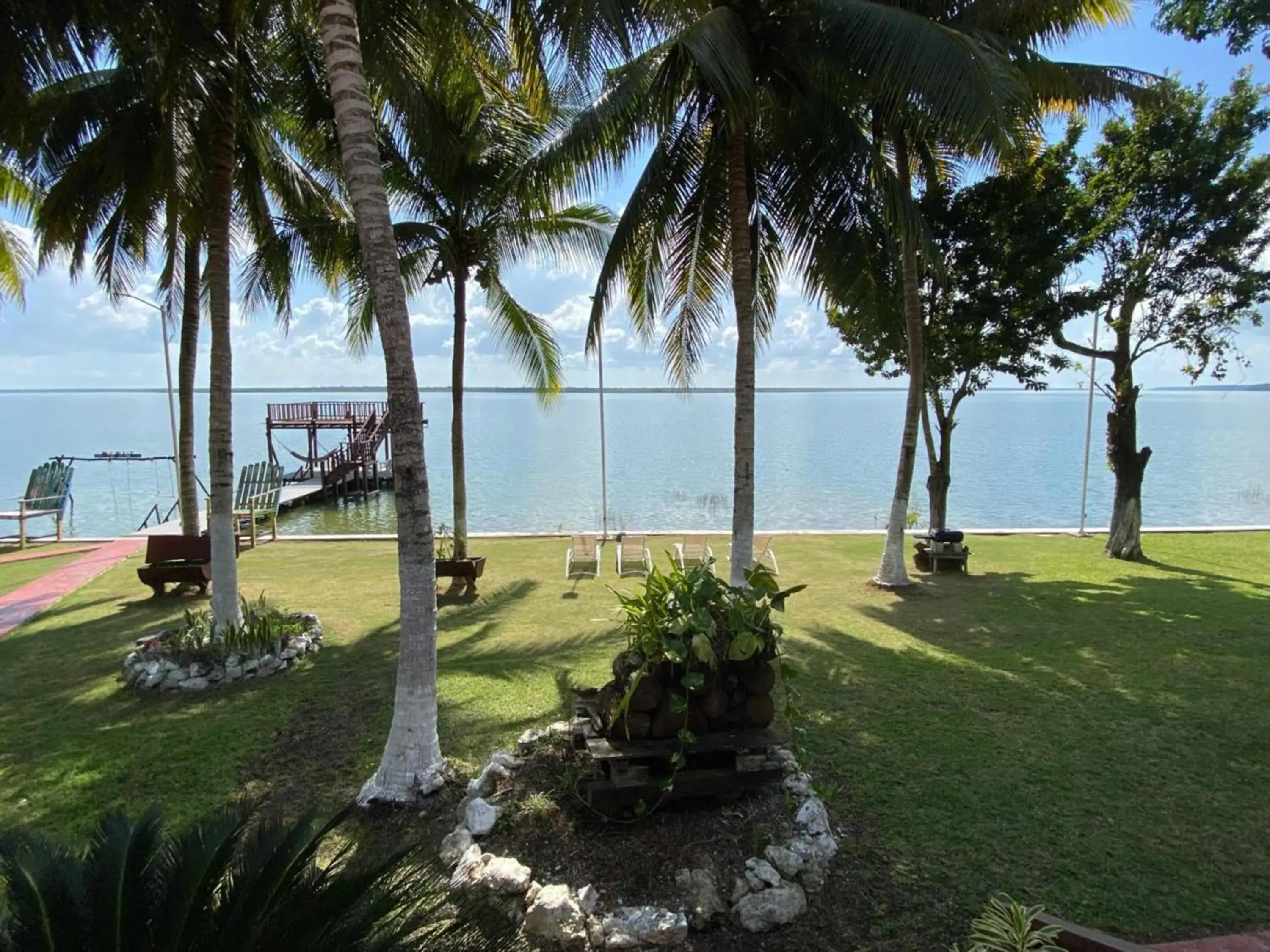 Garden view in Coras Place Bacalar Lagoon front Garden view in Coras Place Bacalar Lagoon front