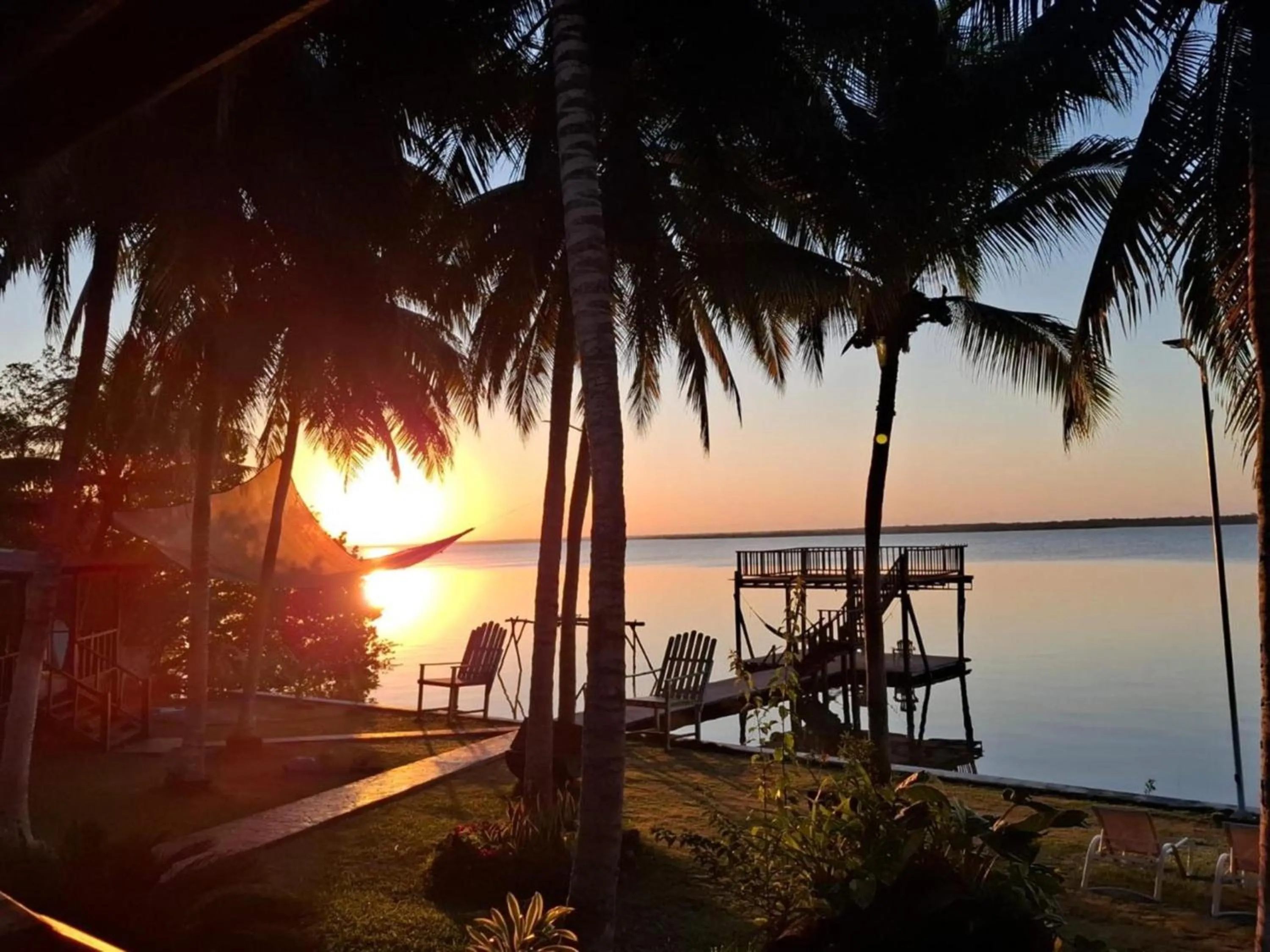 Sunset in Coras Place Bacalar Lagoon front