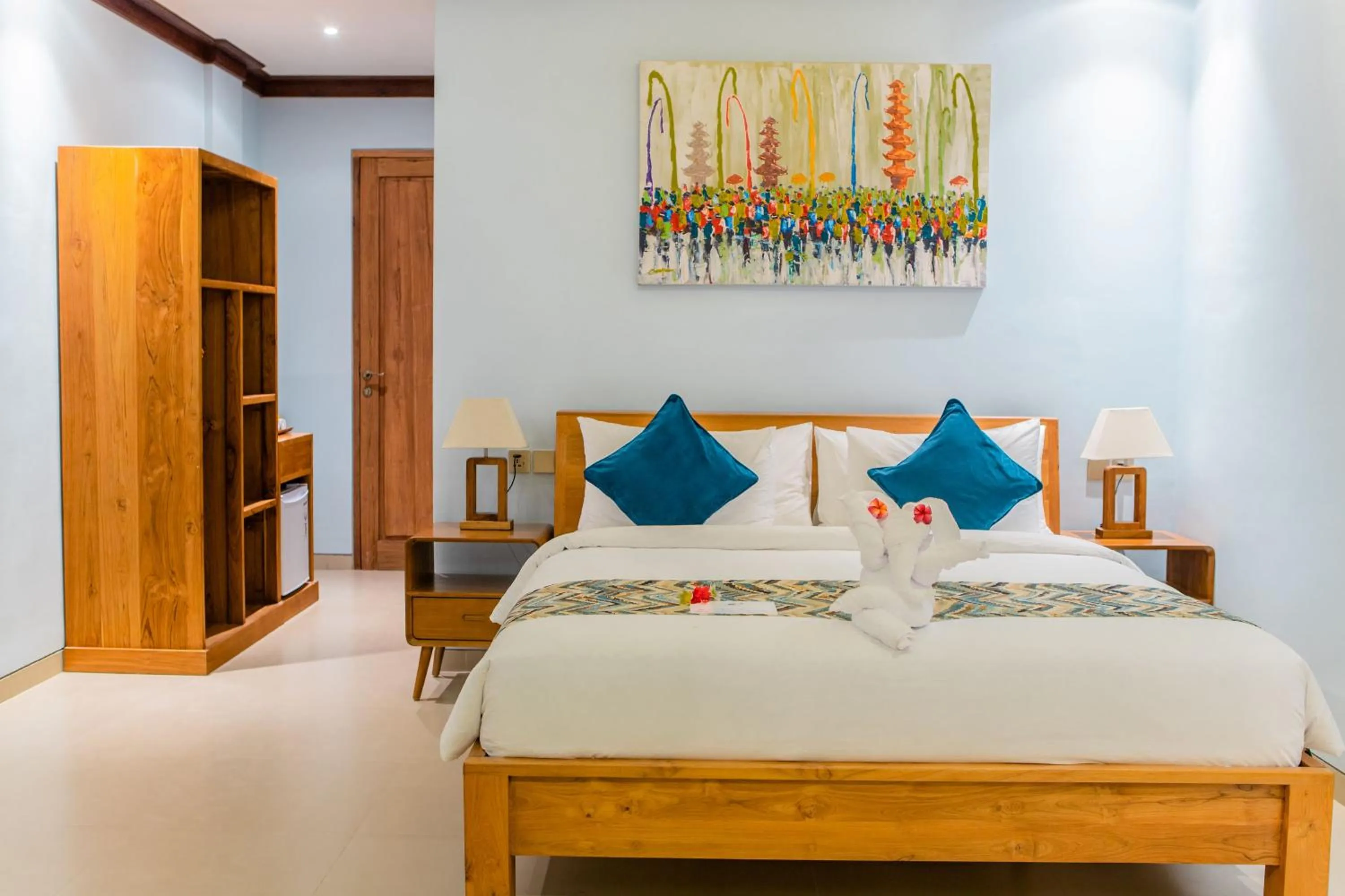 Bed in Blue Harbor Beachfront Villas & Resto