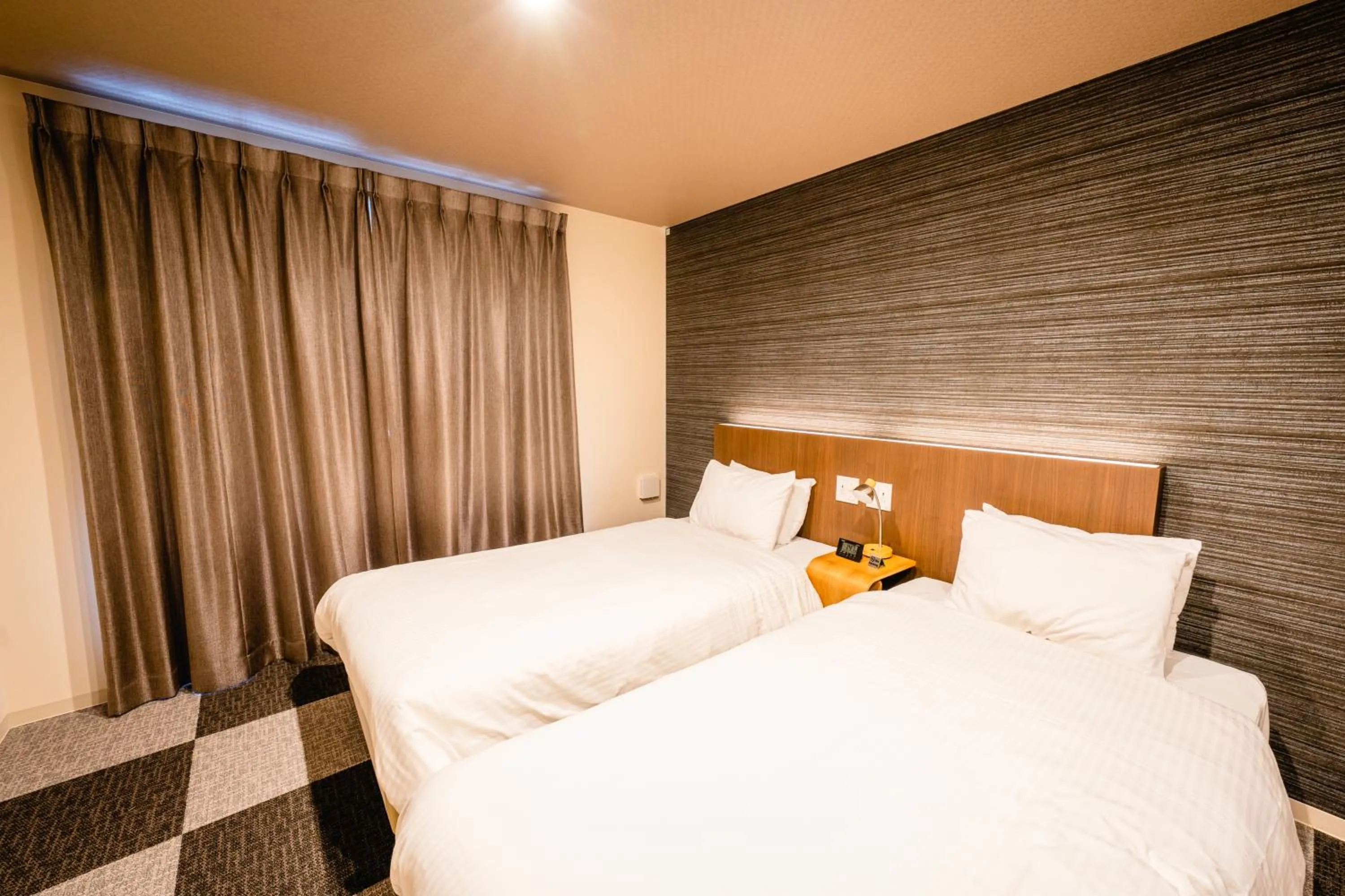 Bed in HOTEL THE POINT Kiyomizu Gojo