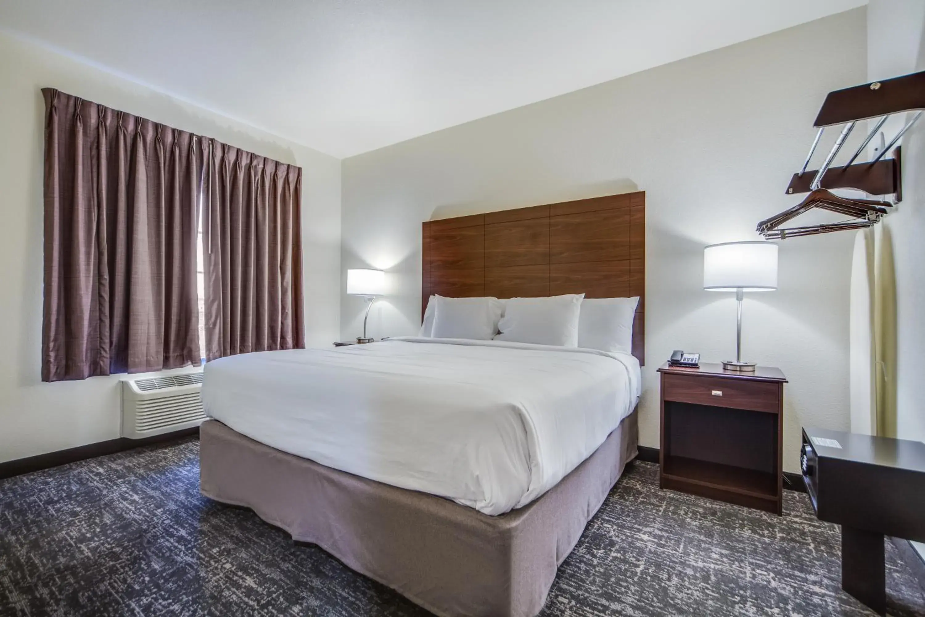 Bed in Cobblestone Hotel & Suites - Cozad Bed in Cobblestone Hotel & Suites - Cozad
