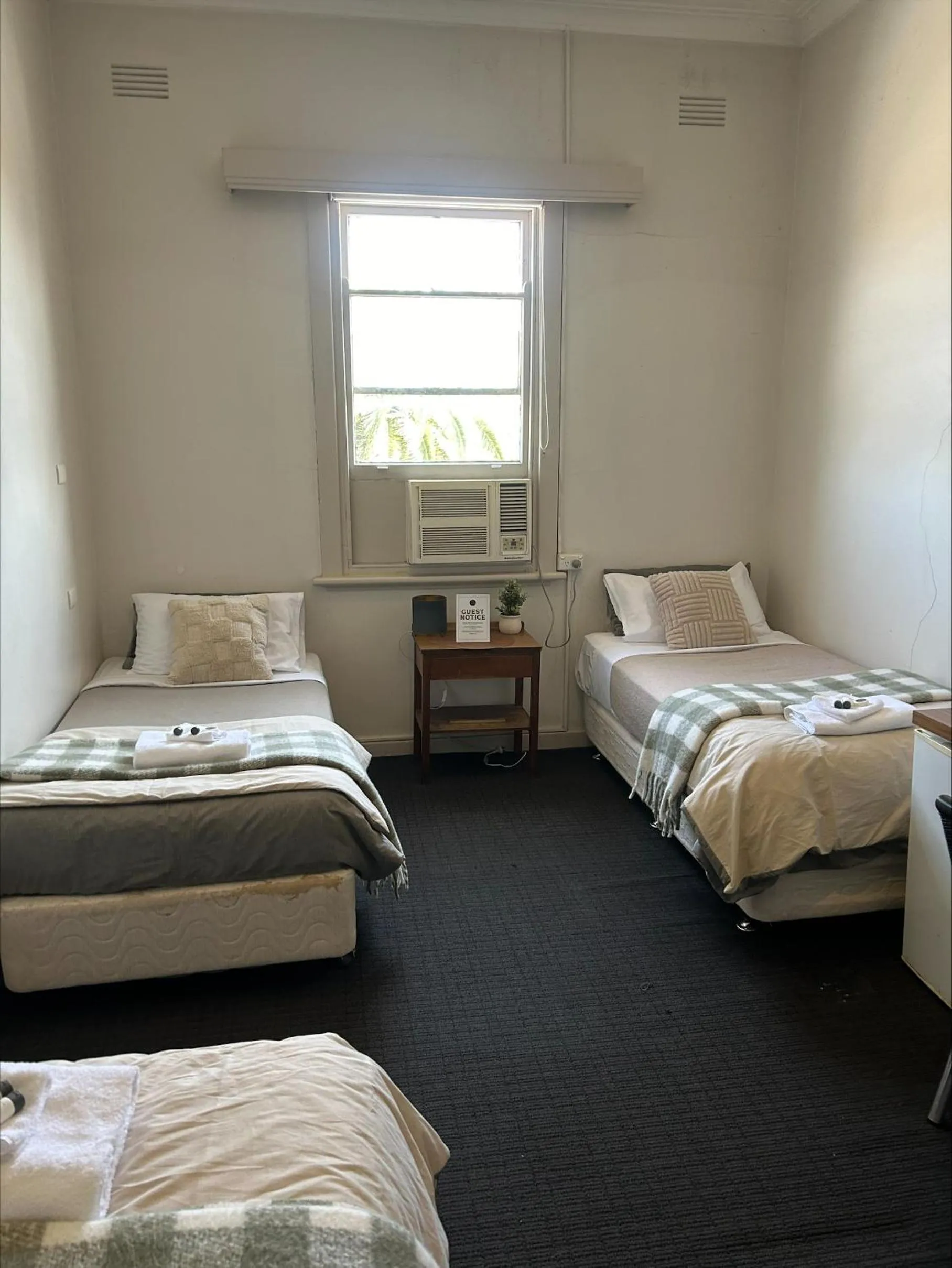 Bed in William Farrer Hotel