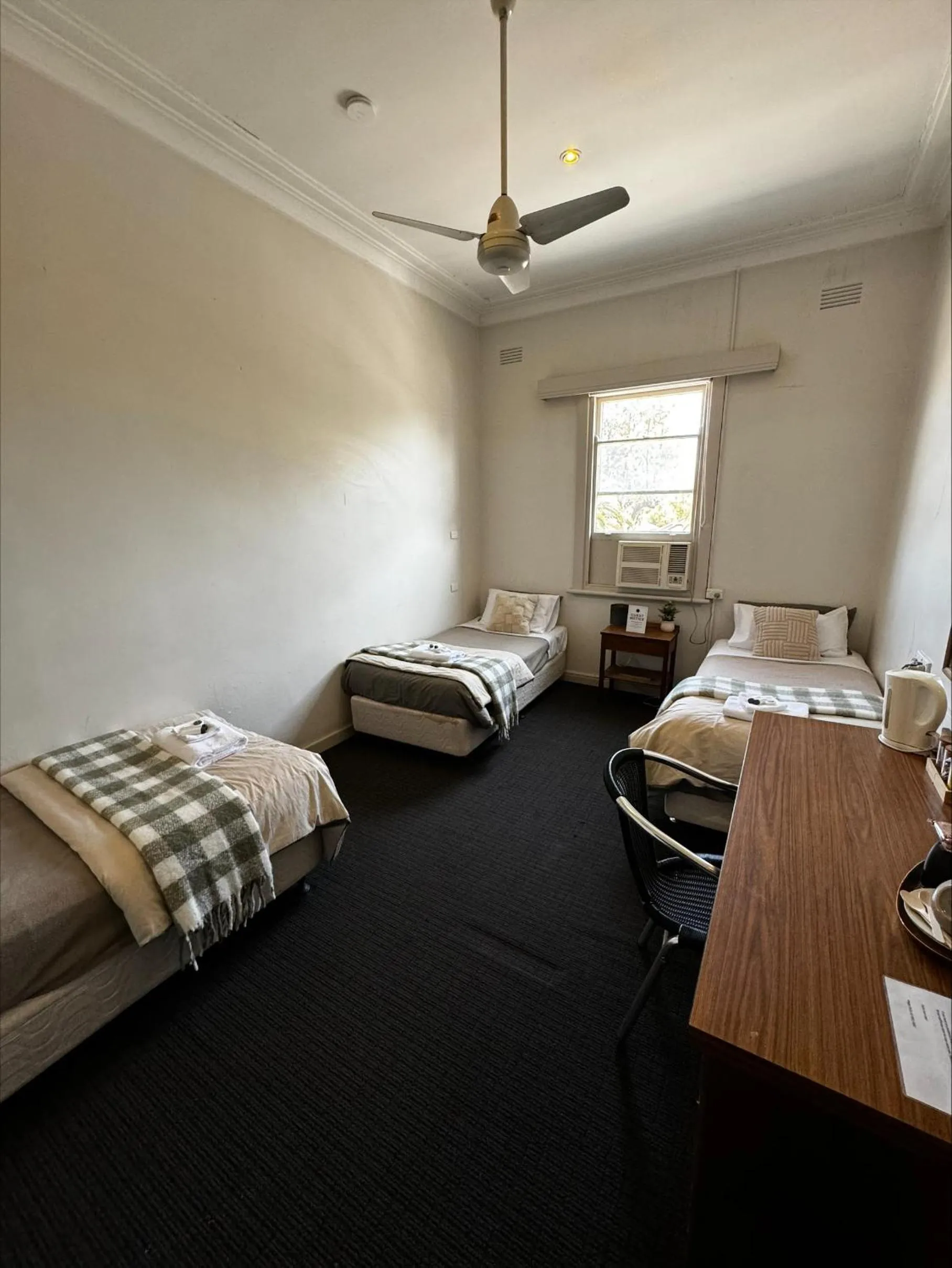 Bed in William Farrer Hotel