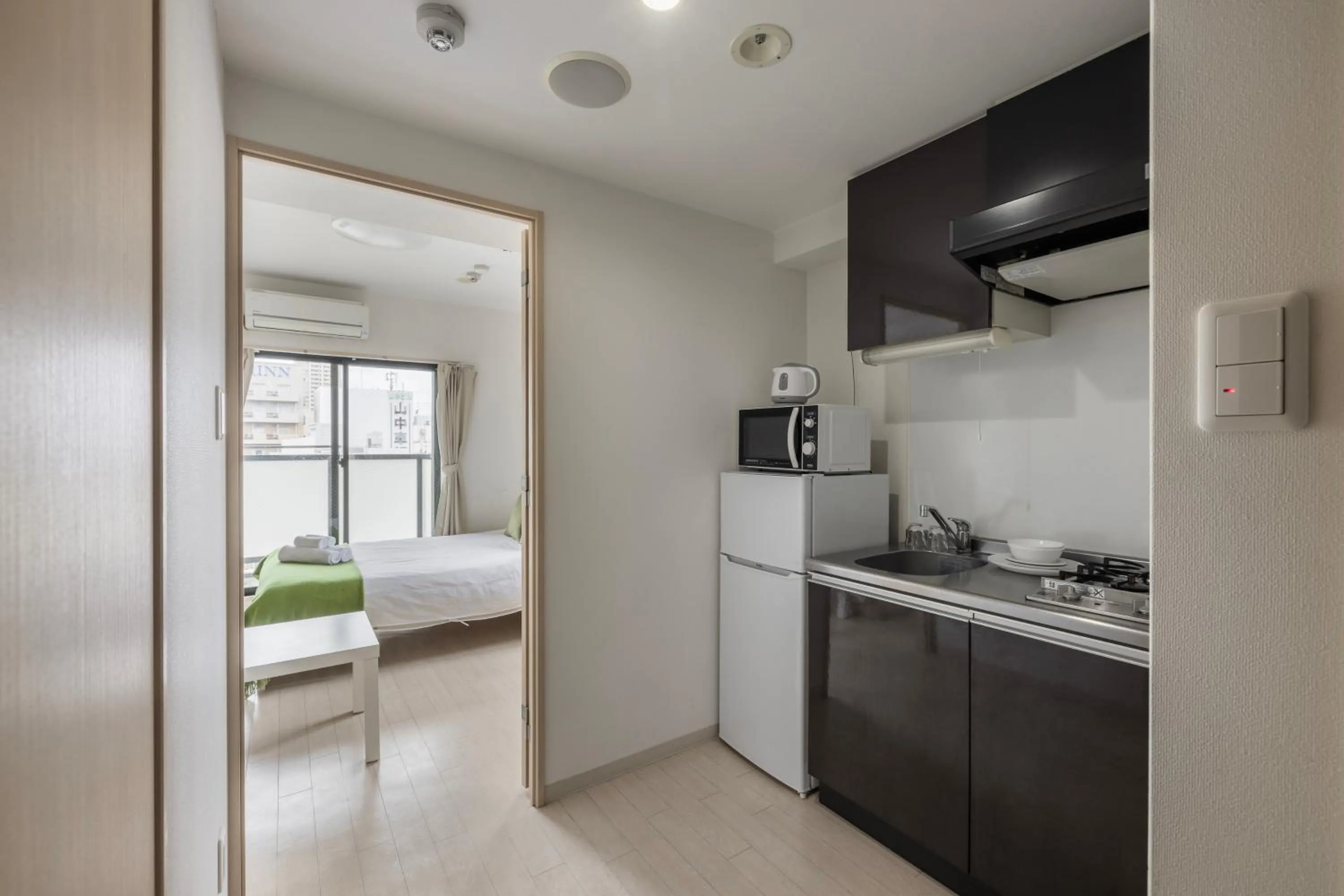 Bed in Prendre Namba AFP Apartment