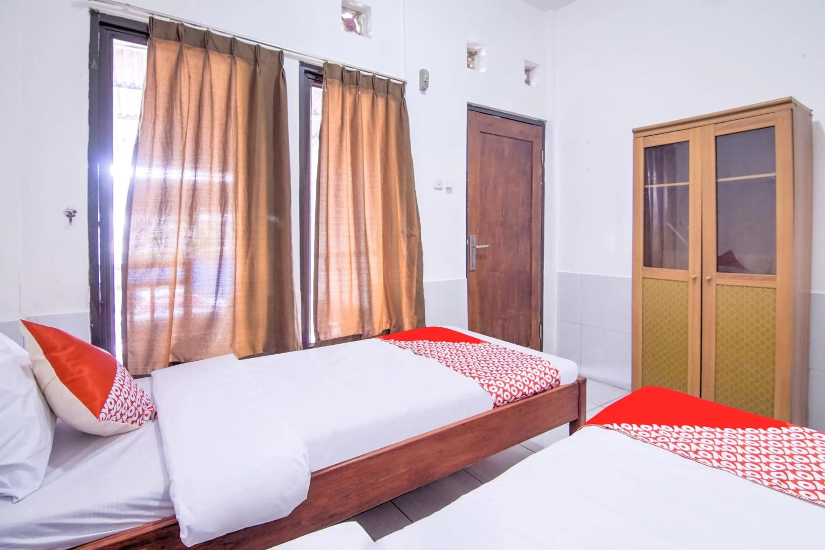 Bedroom in OYO 3317 Maju Jaya Homestay Syariah