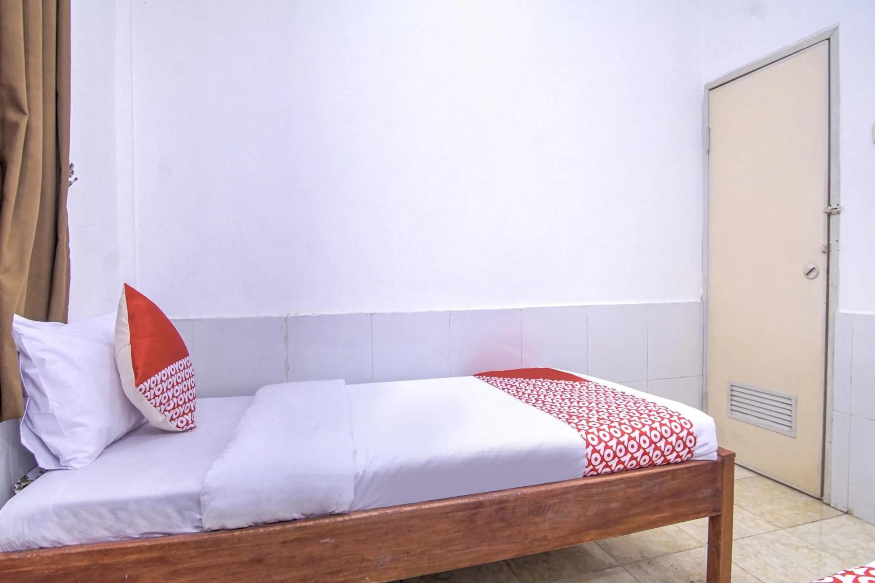Bedroom in OYO 3317 Maju Jaya Homestay Syariah