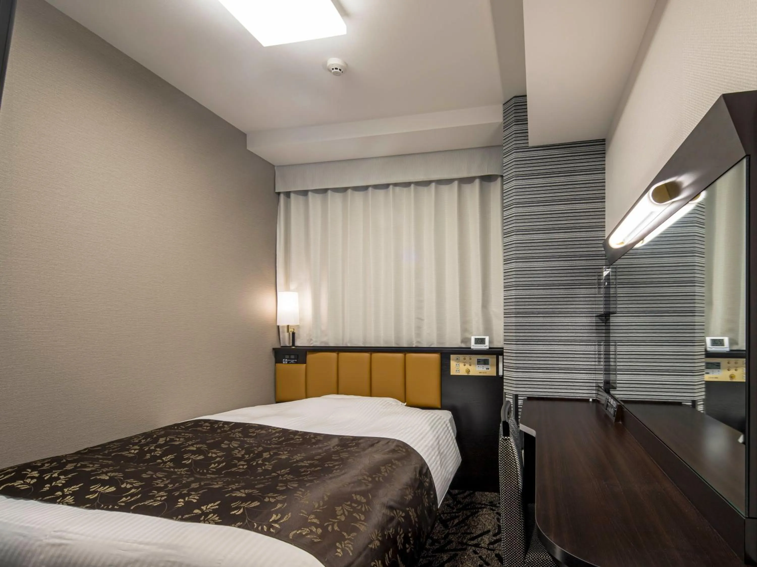 Photo of the whole room, Bed in APA Hotel Nagoya Ekimae Kita
