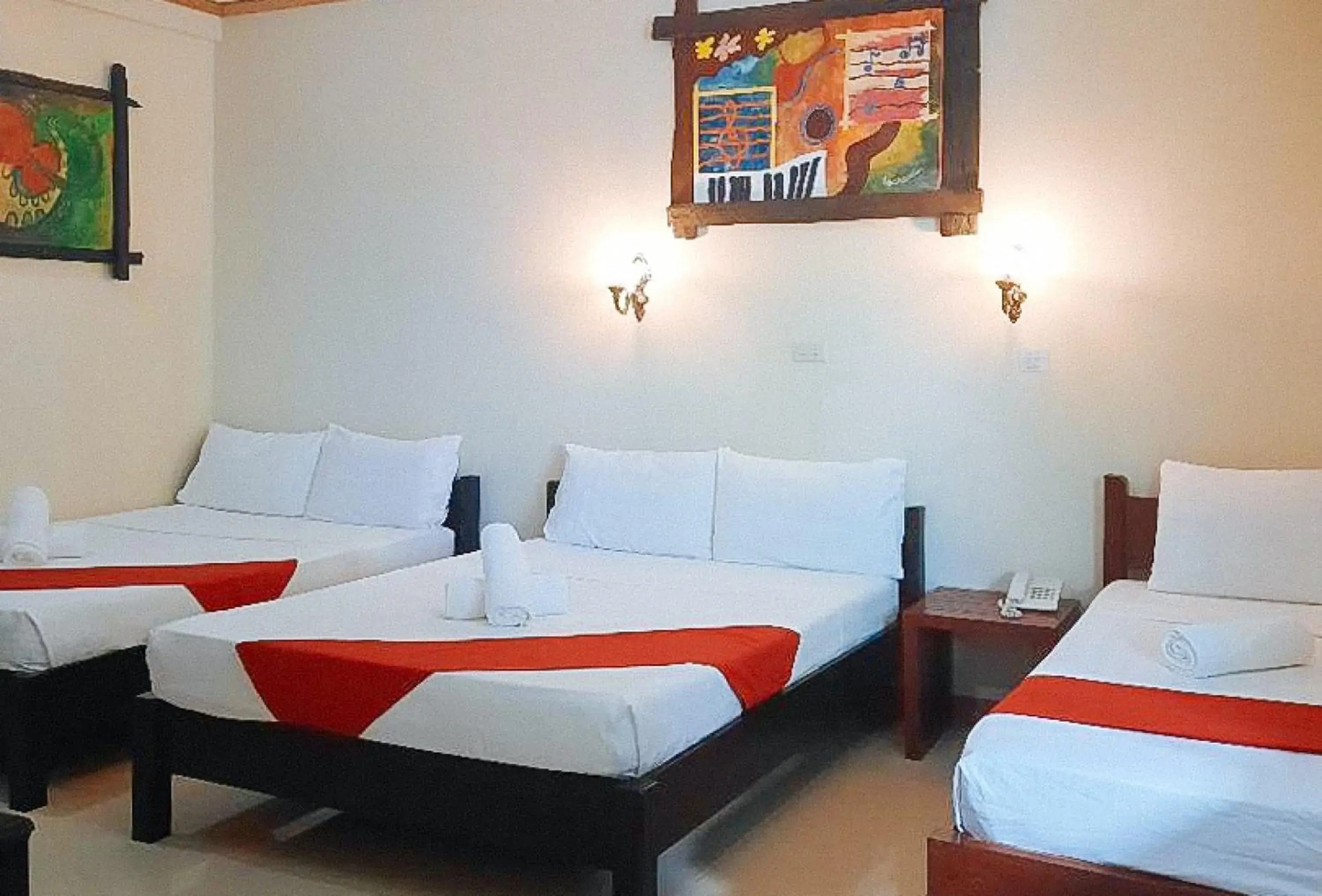 Bed in RedDoorz at New Casamila Hotel Palawan Bed in RedDoorz at New Casamila Hotel Palawan