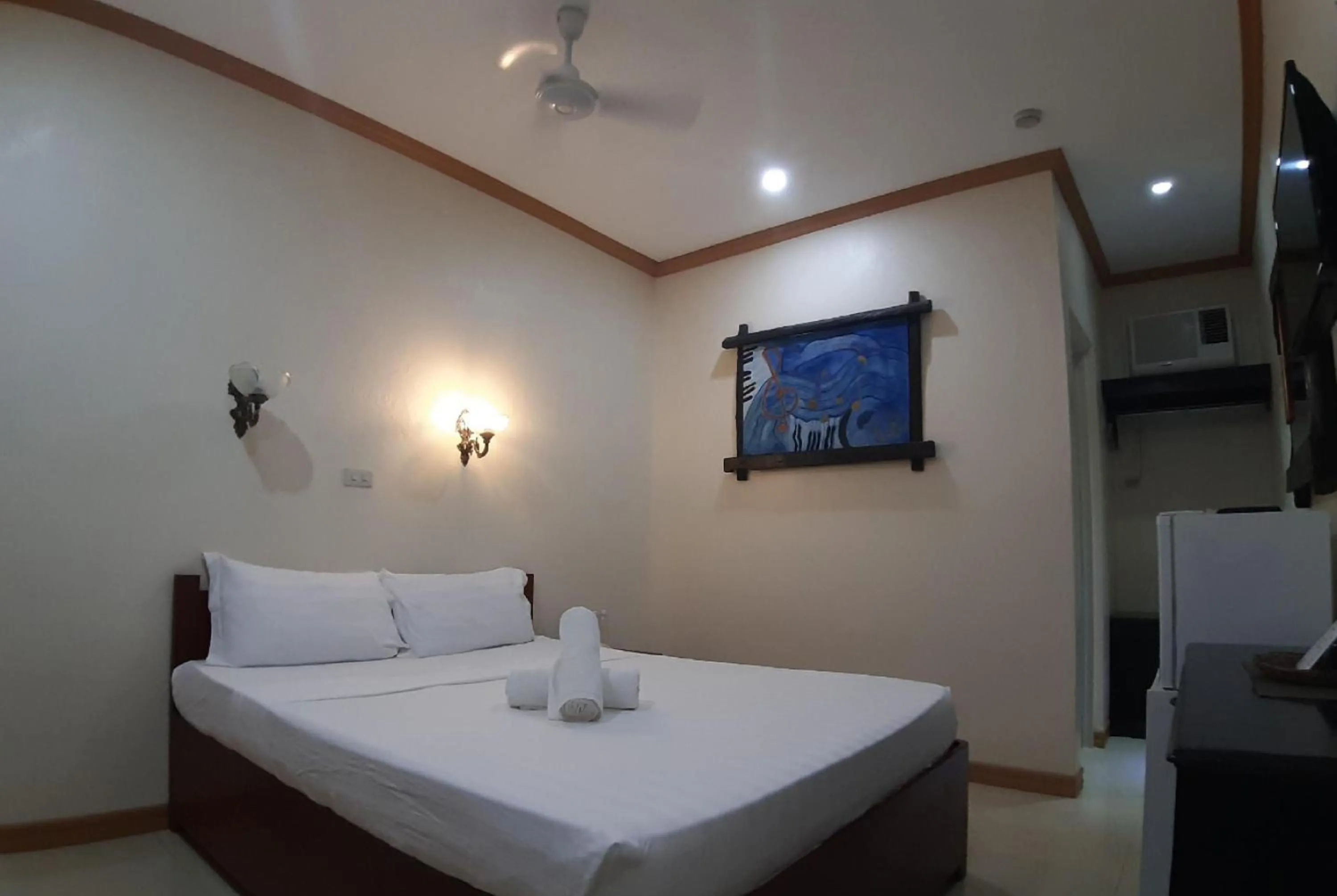 Bed in RedDoorz at New Casamila Hotel Palawan