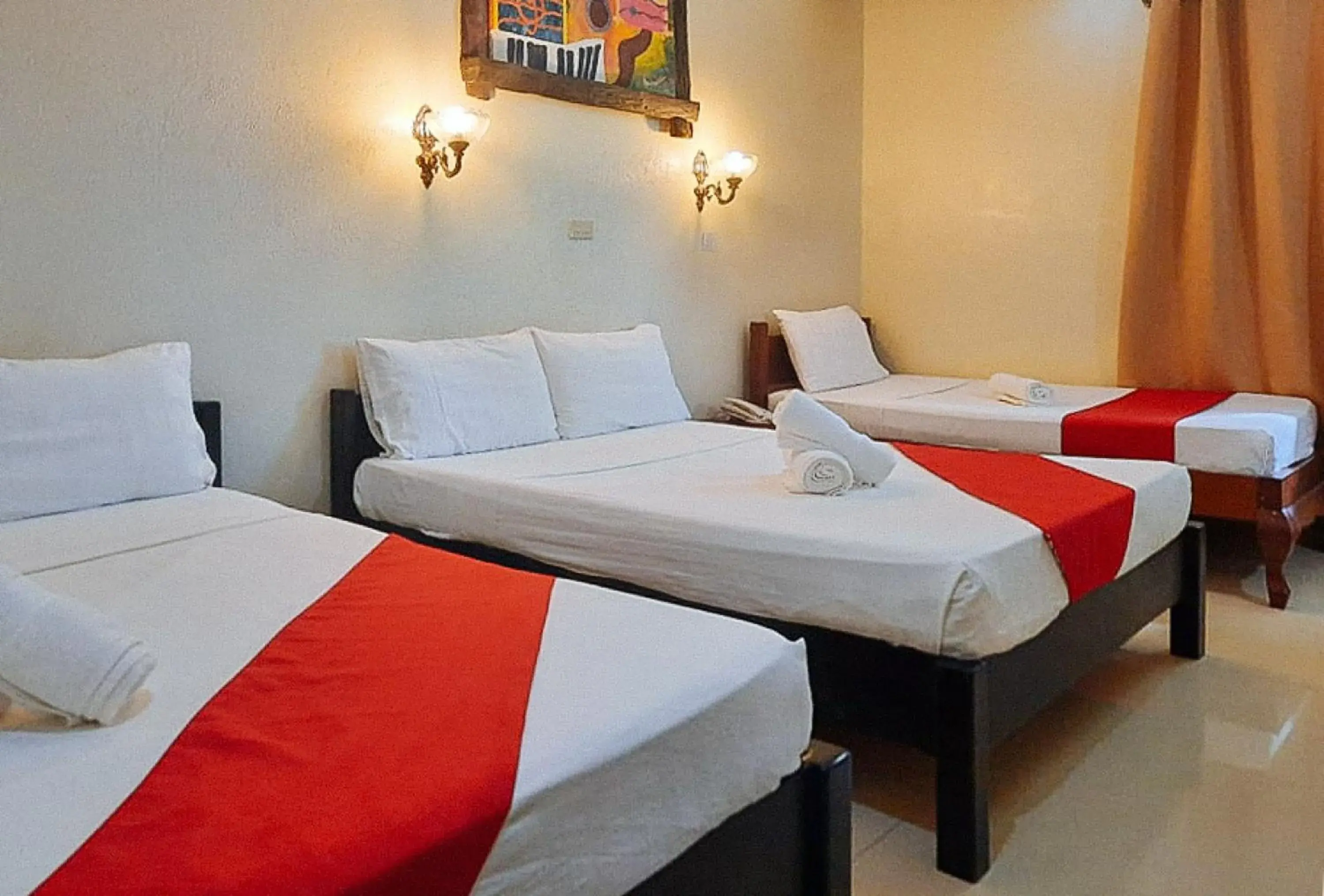 Bed in RedDoorz at New Casamila Hotel Palawan Bed in RedDoorz at New Casamila Hotel Palawan