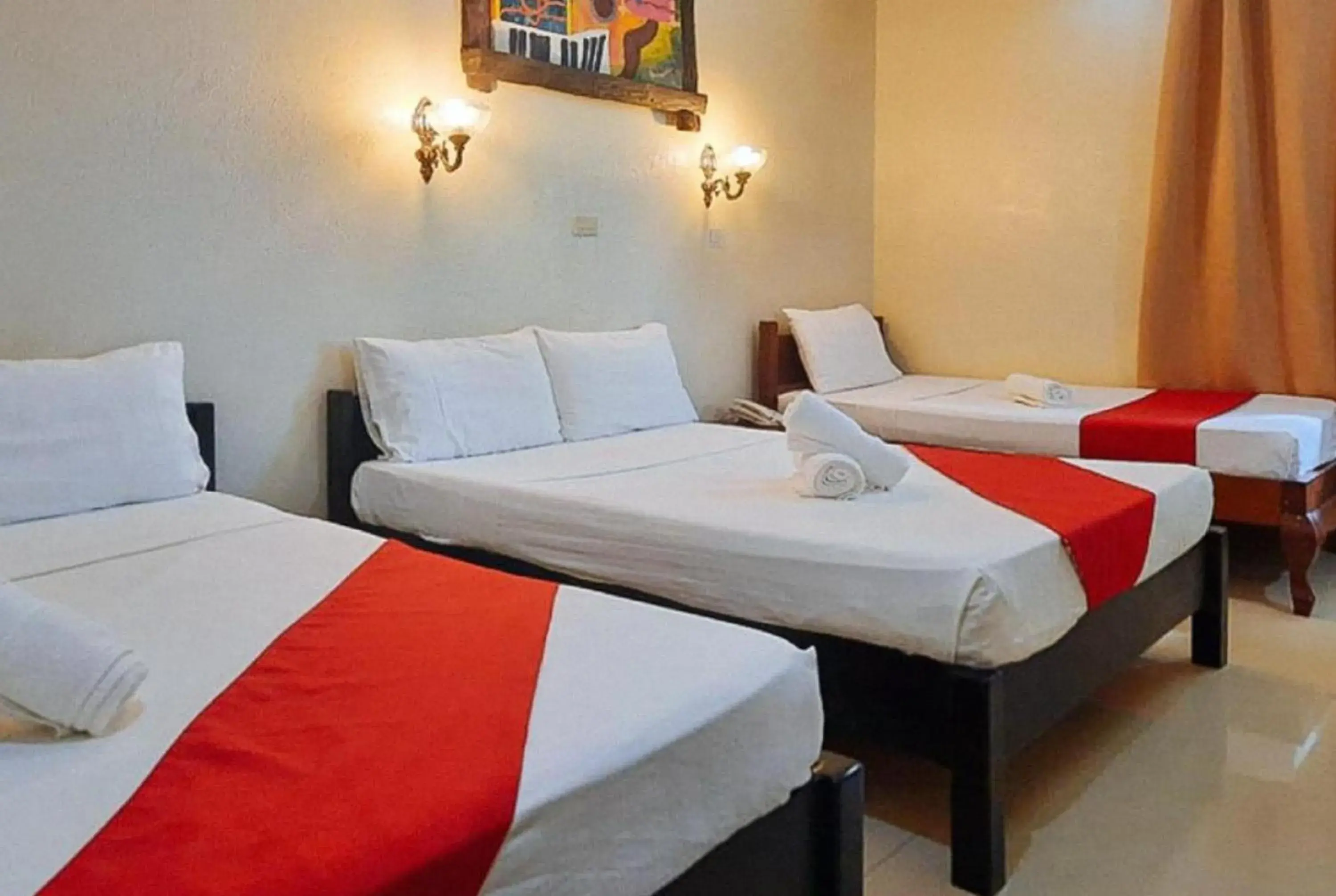 Bed in RedDoorz at New Casamila Hotel Palawan Bed in RedDoorz at New Casamila Hotel Palawan