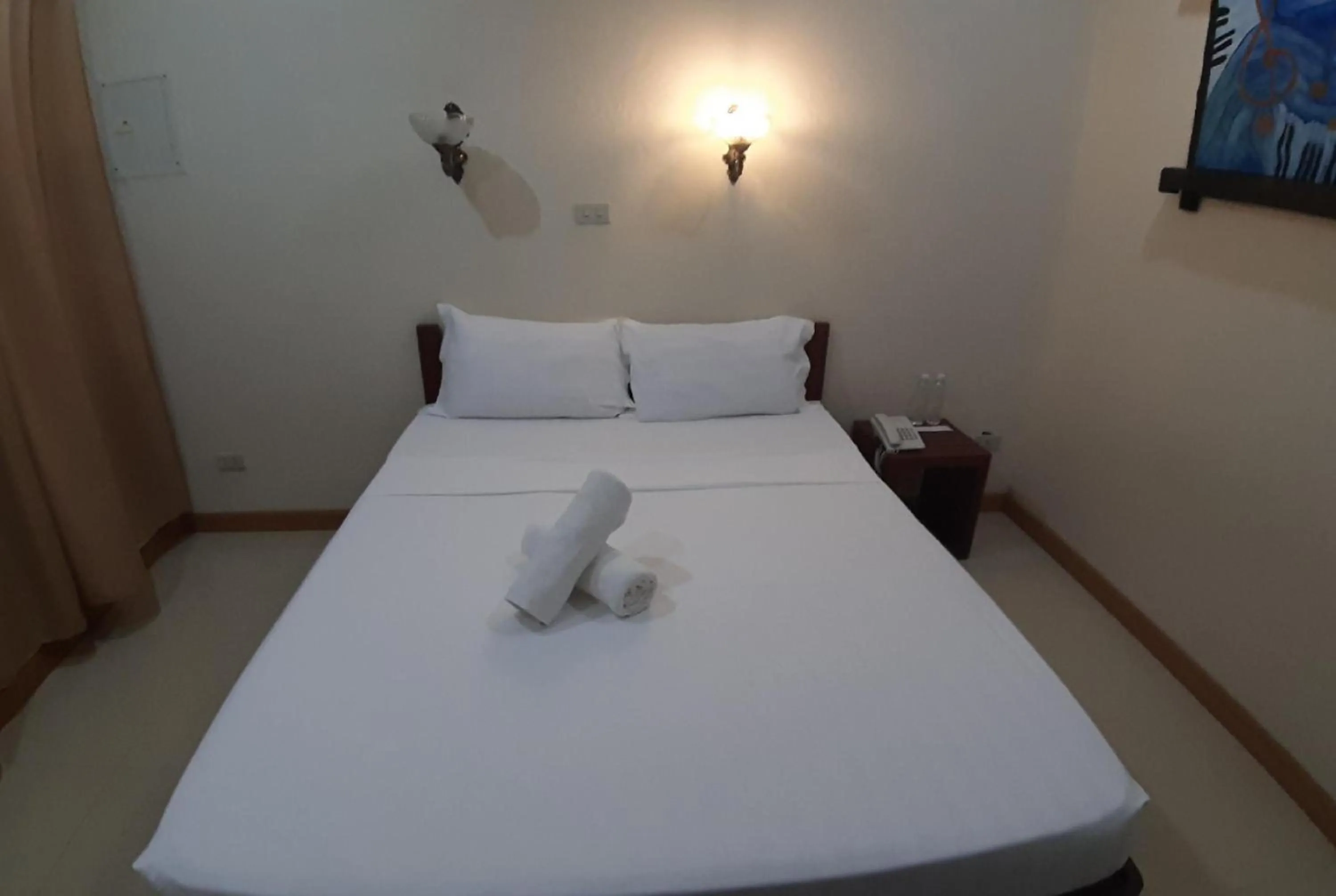 Bed in RedDoorz at New Casamila Hotel Palawan