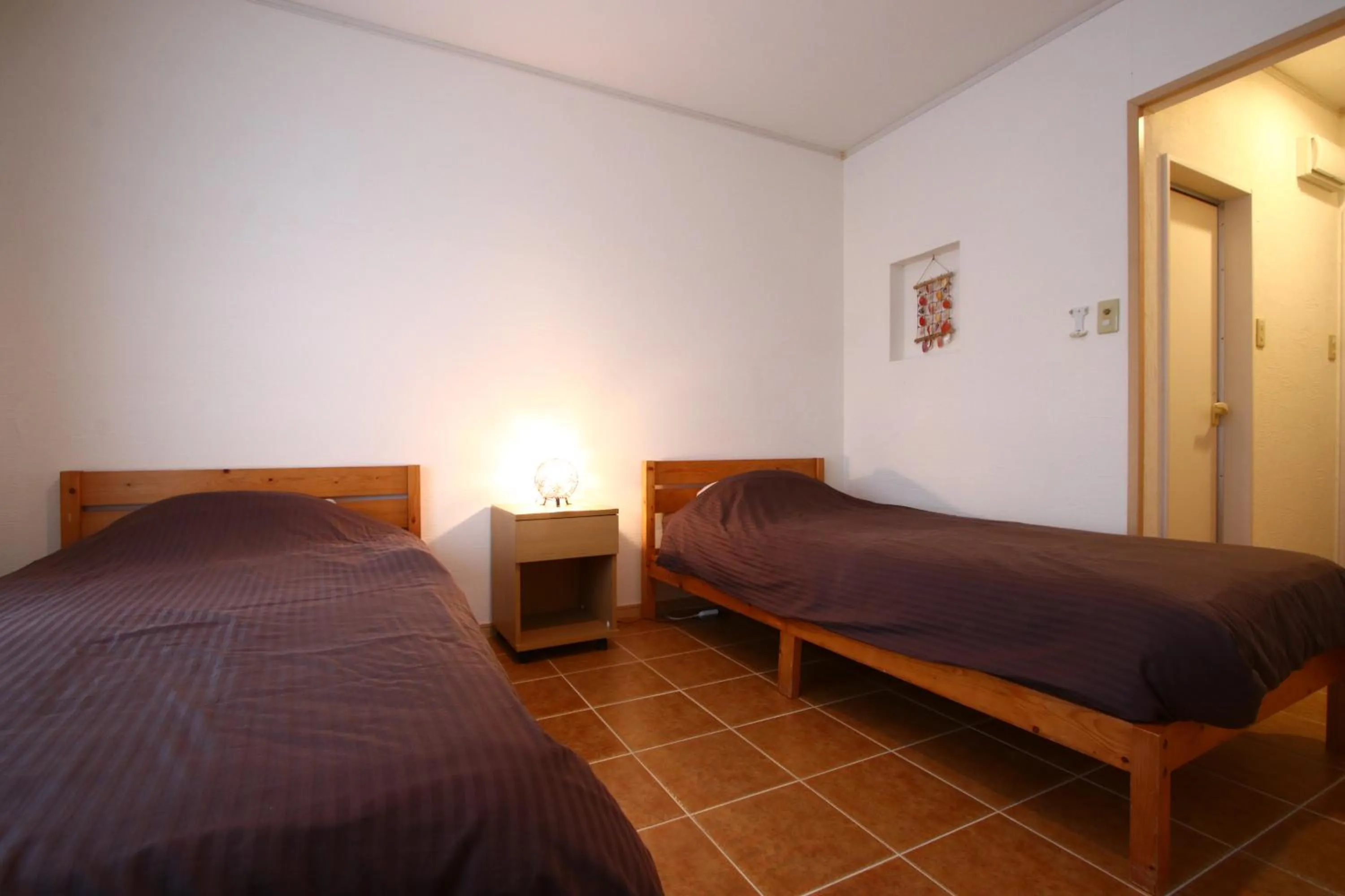 Bed in AsobiBASE Yamabare-House