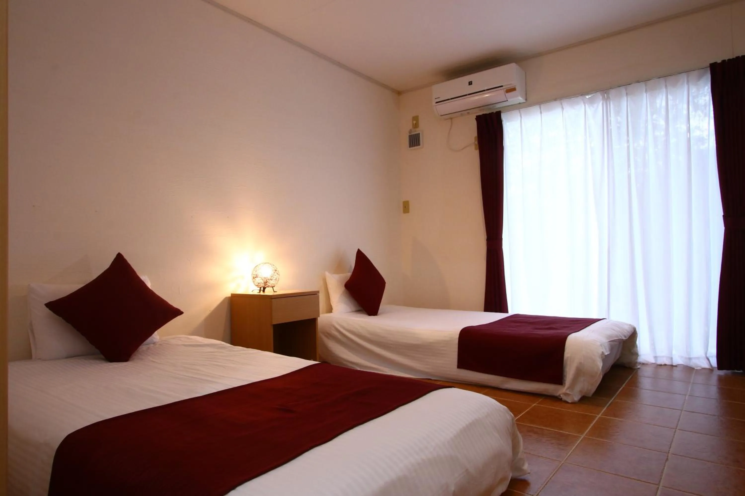 Bed in AsobiBASE Yamabare-House