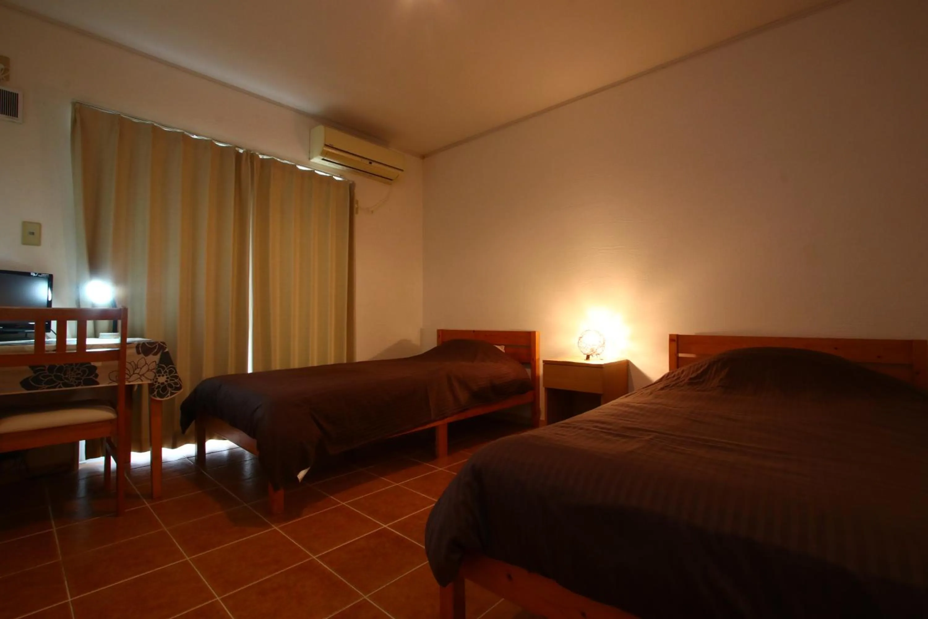 Bed in AsobiBASE Yamabare-House