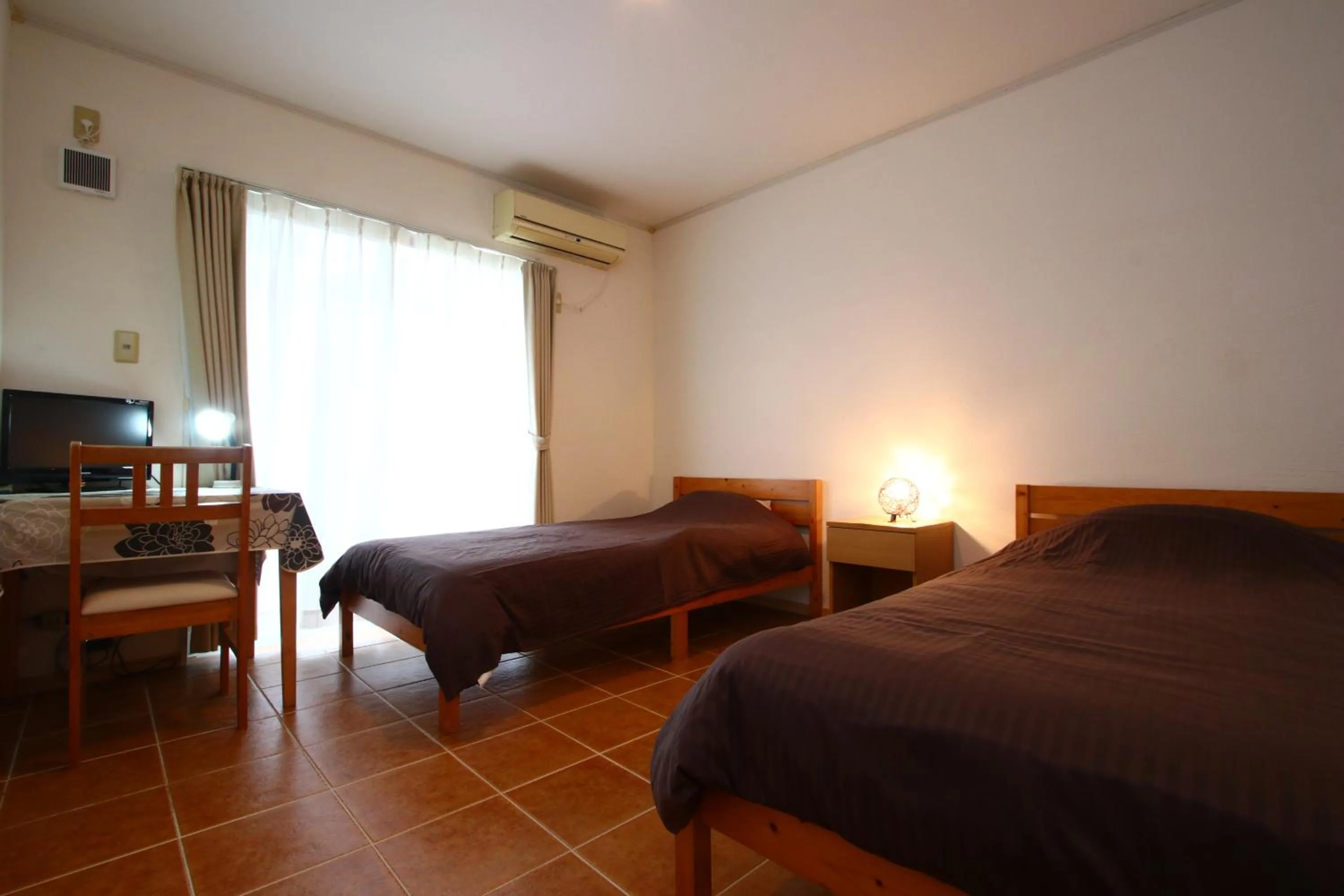 Bed in AsobiBASE Yamabare-House