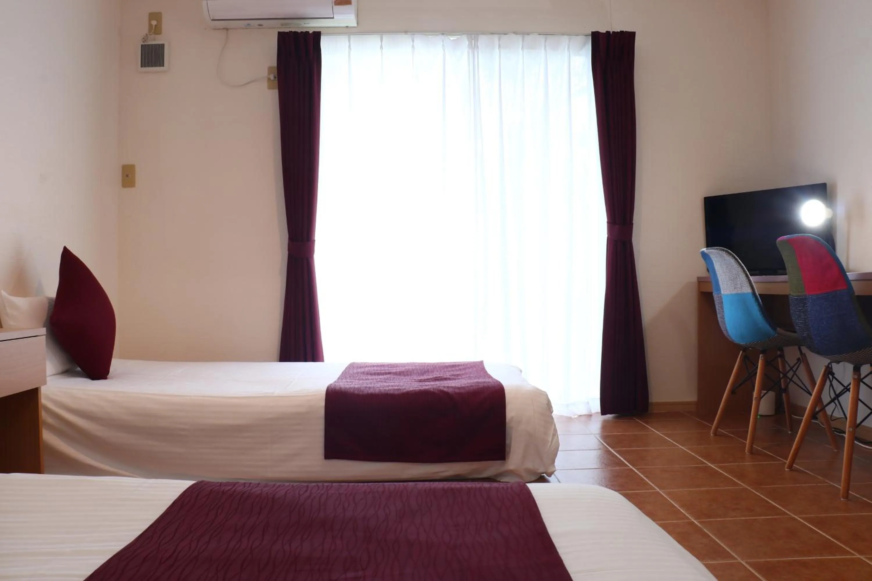 Bed in AsobiBASE Yamabare-House