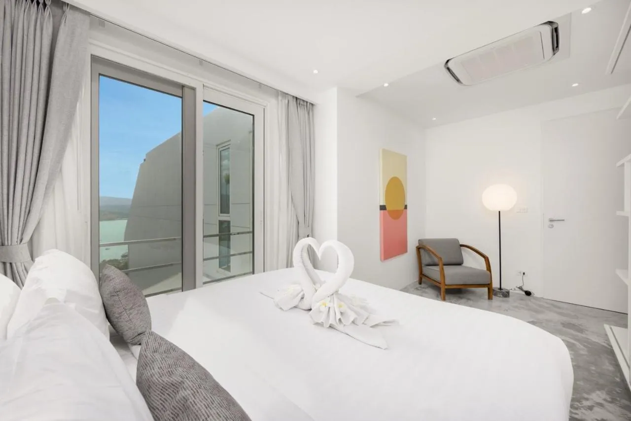 Bed in UniQue BoutiQue Resort