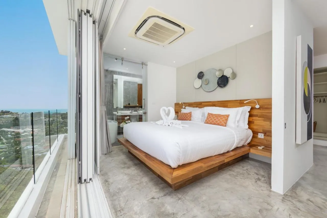 Bed in UniQue BoutiQue Resort