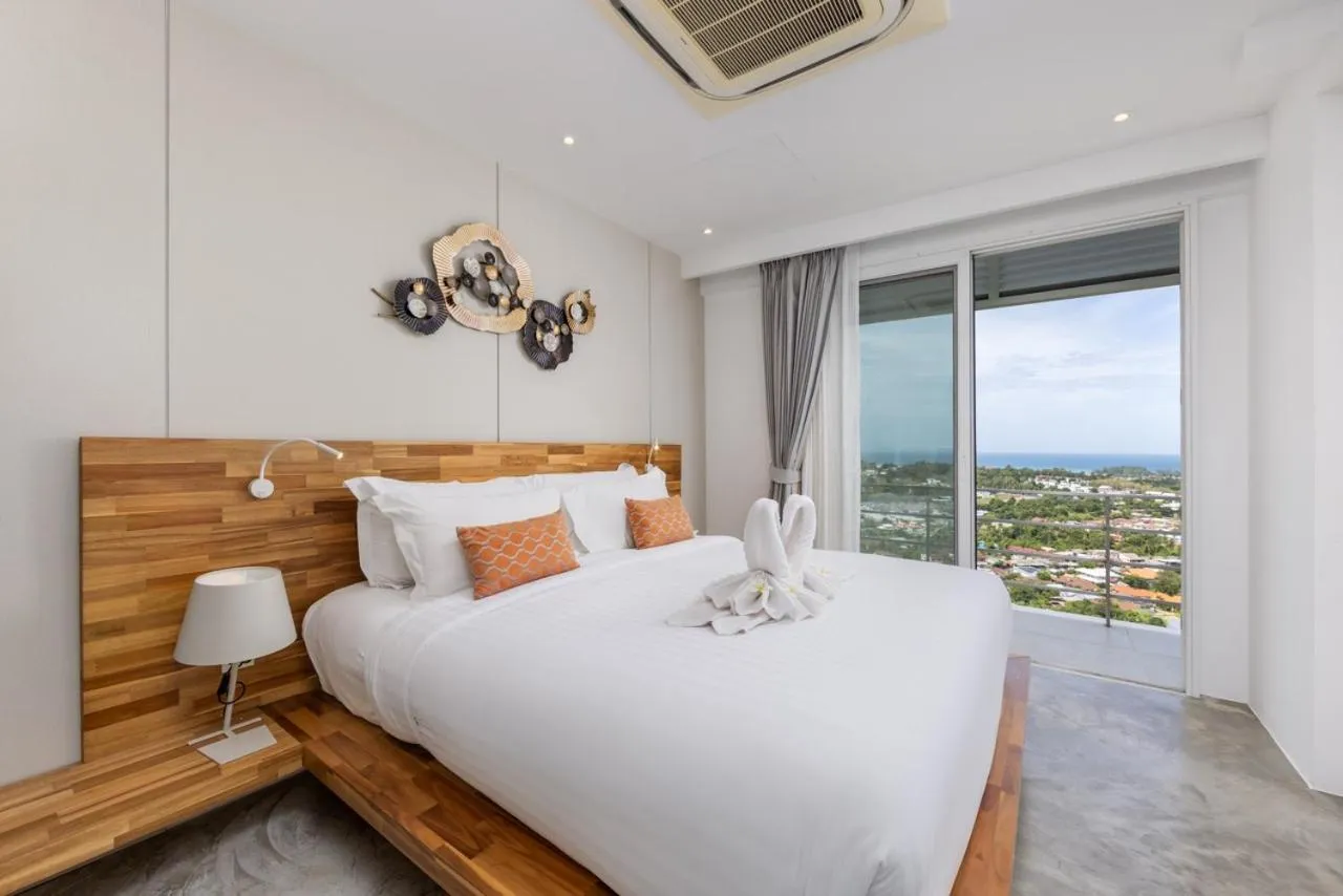 Bed in UniQue BoutiQue Resort