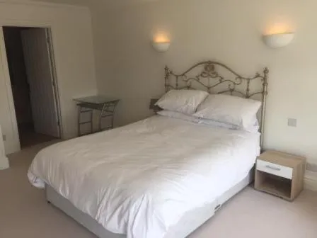 Bed in The Corbyn Apartments