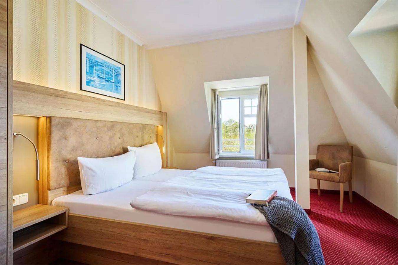 Photo of the whole room, Bed in Strandhotel garni Kormoran