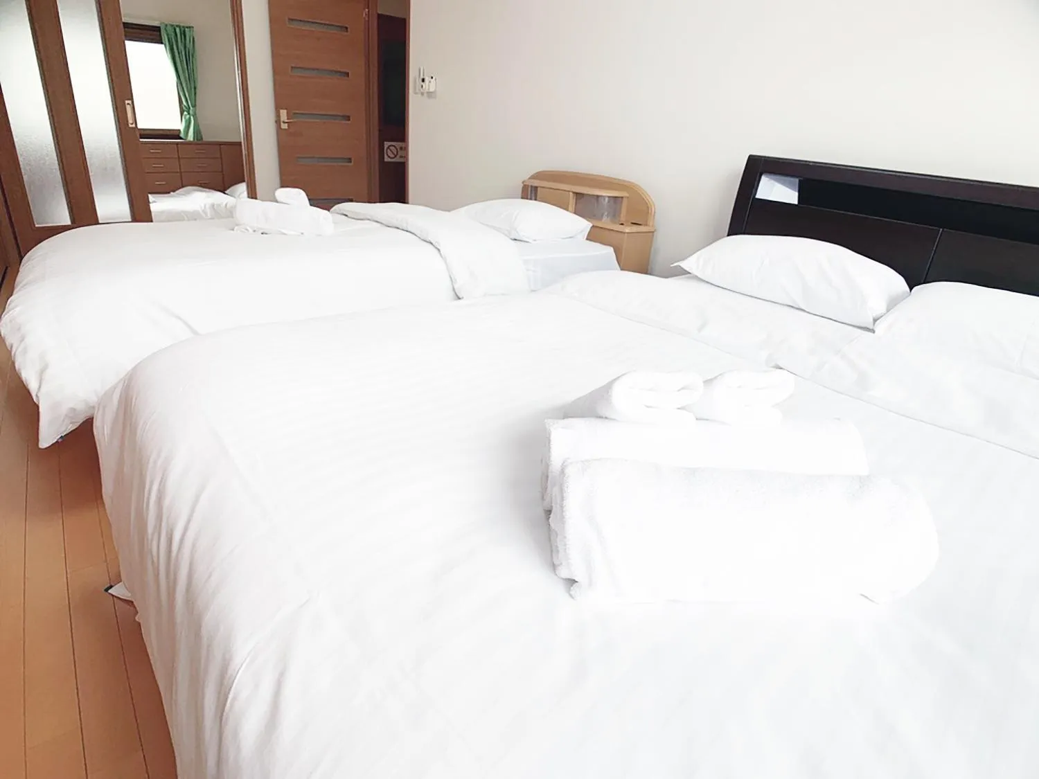 Bed in Itsukaichi First Villa Hiroshima