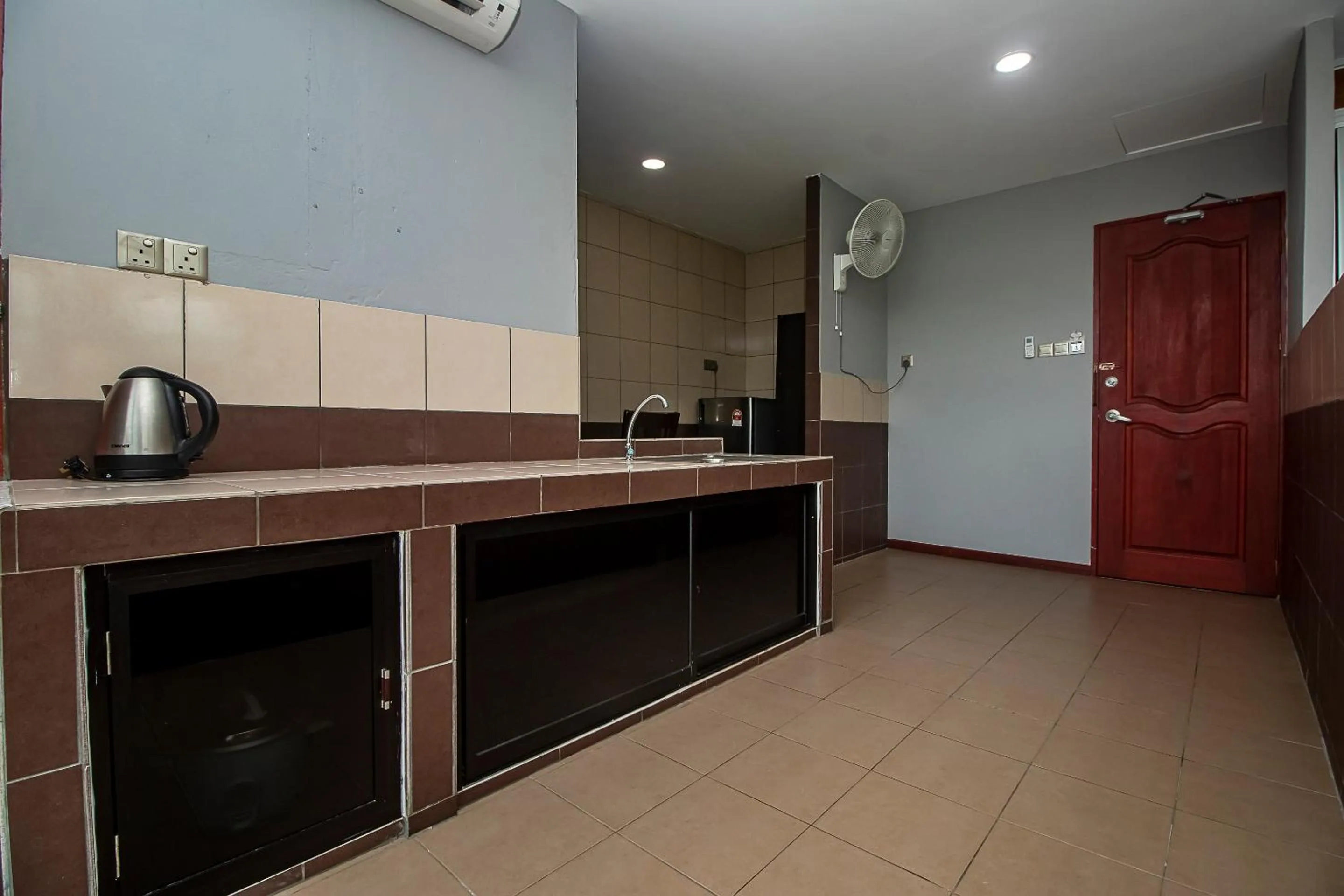 Bedroom in Hotel O Ltk Home