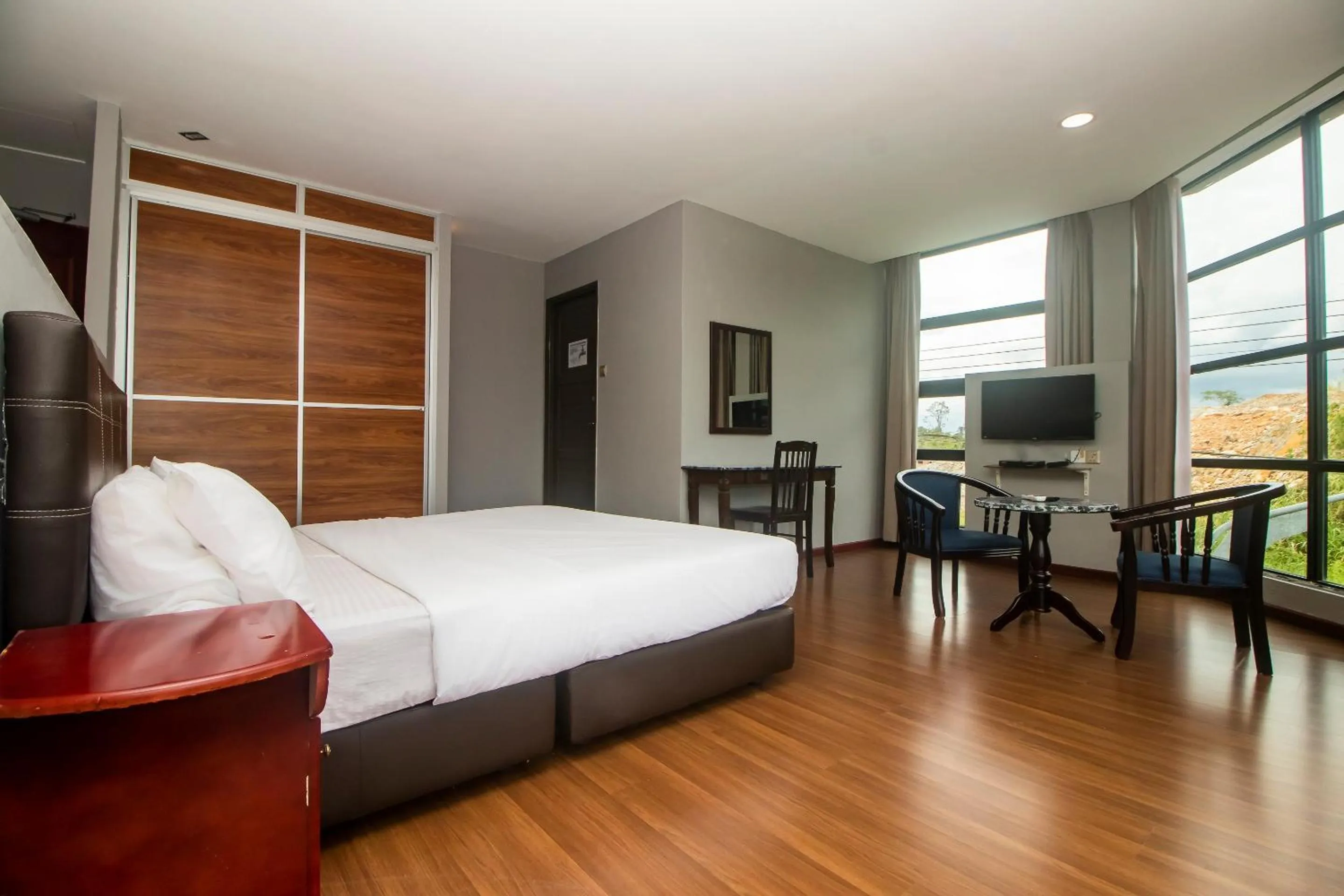 Bedroom in Hotel O Ltk Home