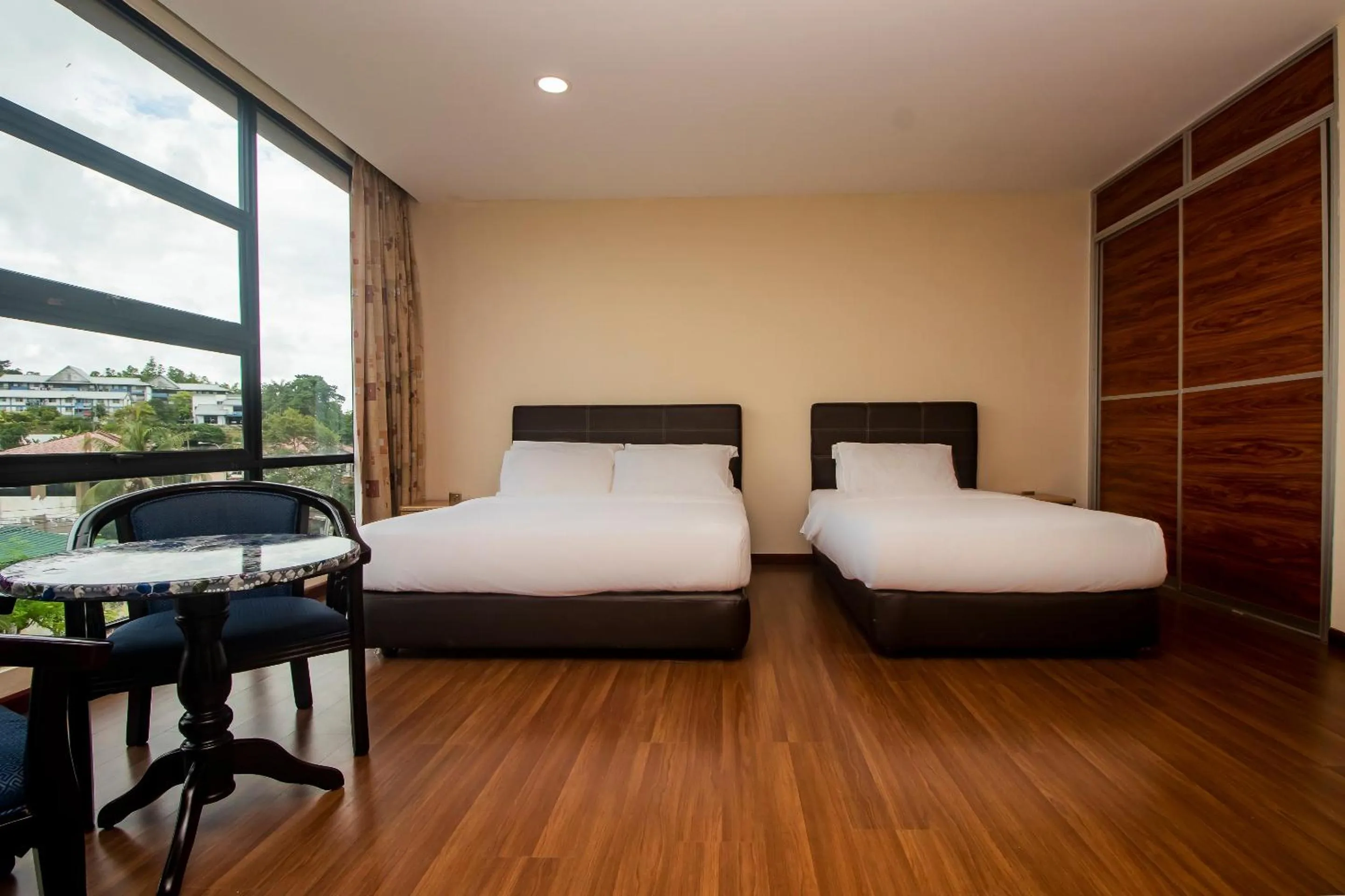 Bedroom in Hotel O Ltk Home