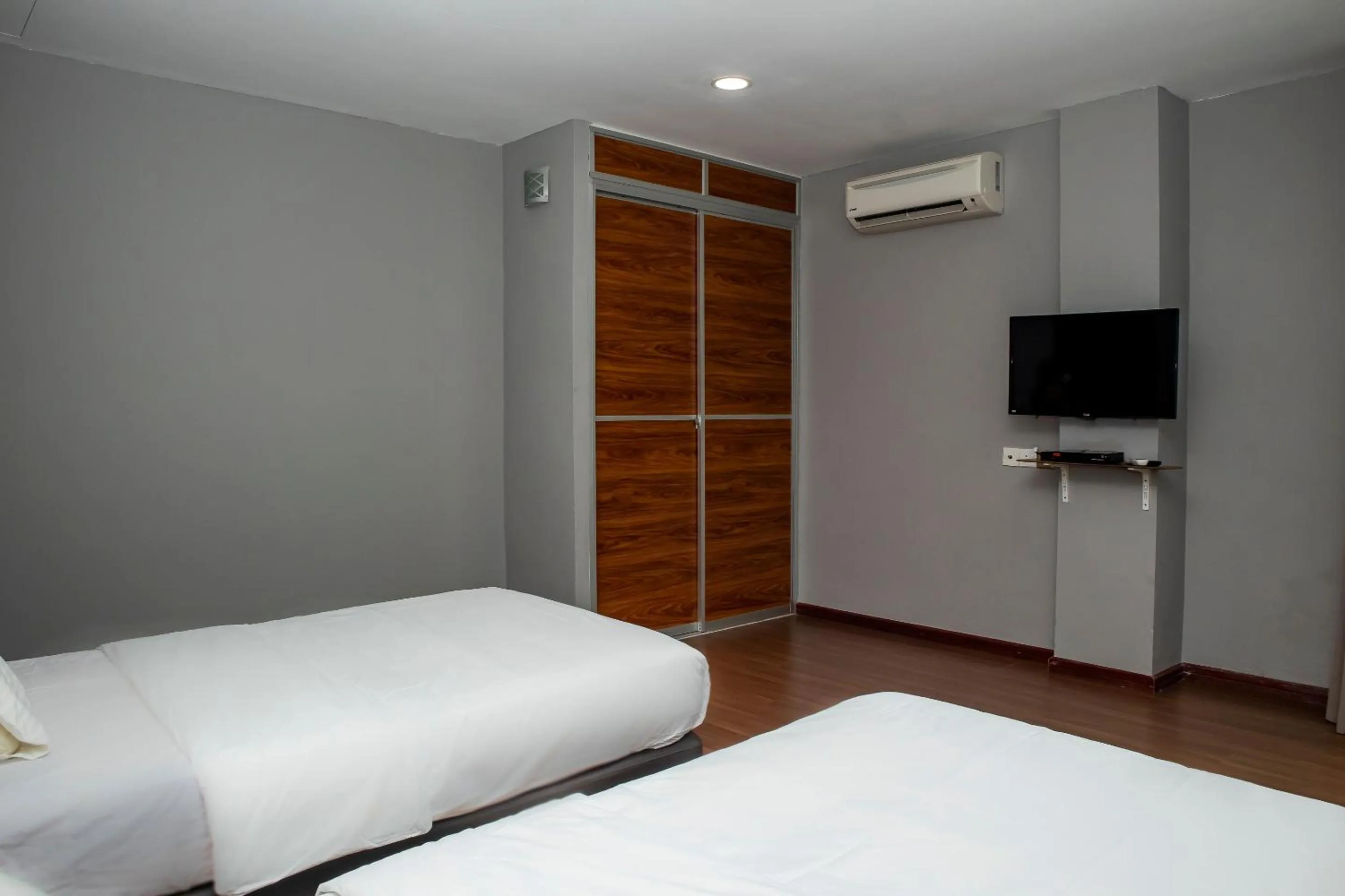 Bedroom in Hotel O Ltk Home
