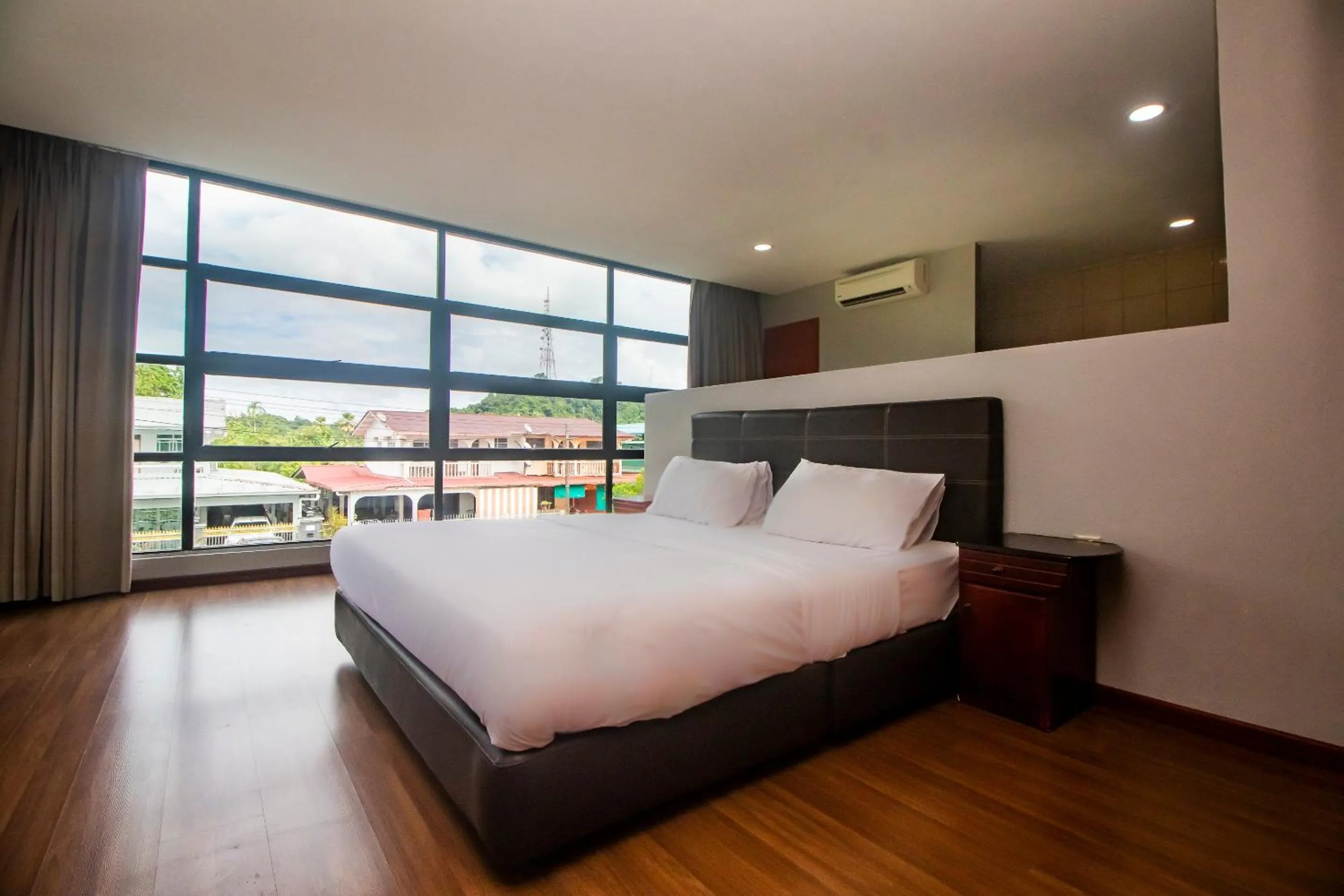 Bedroom in Hotel O Ltk Home