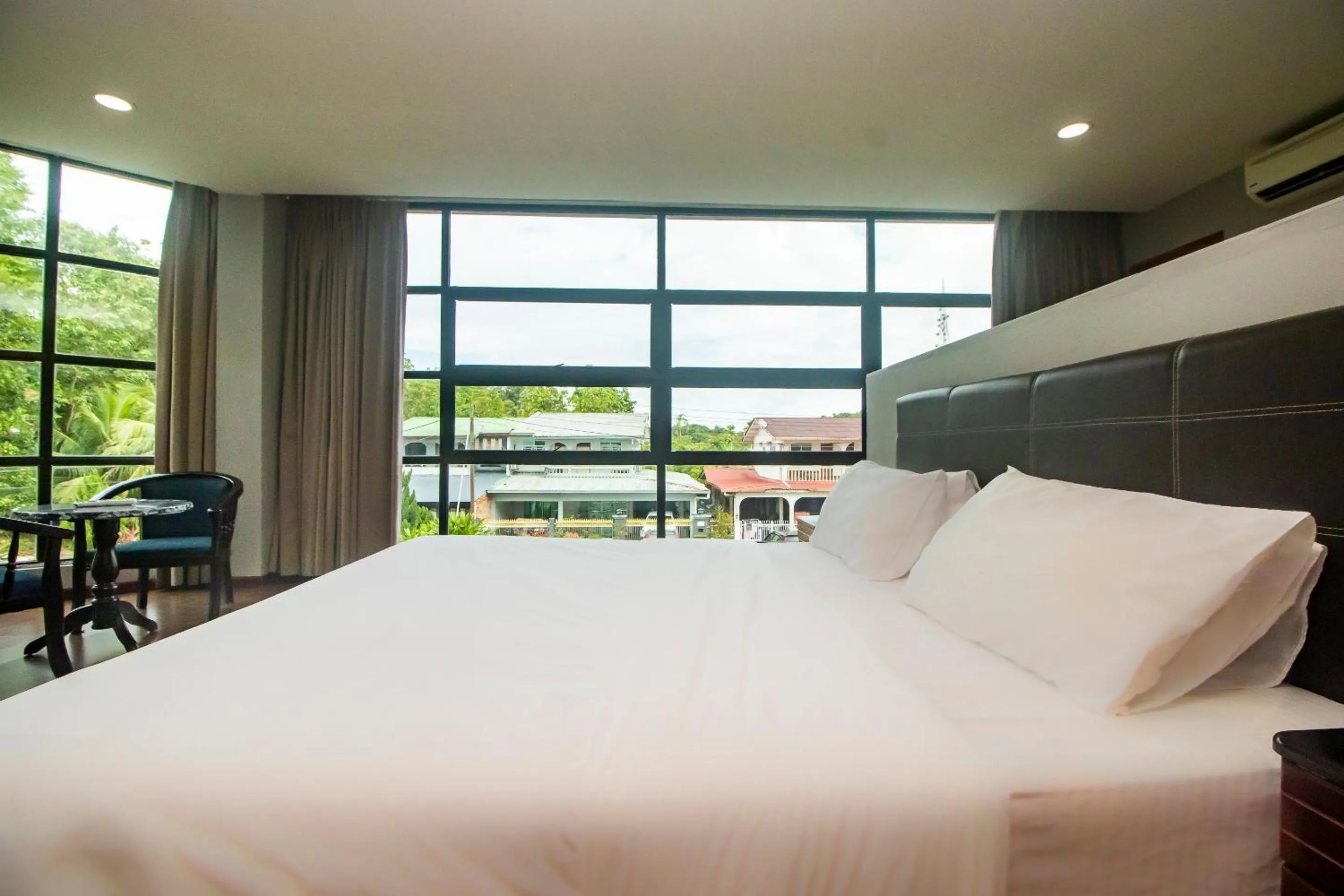 Bedroom in Hotel O Ltk Home