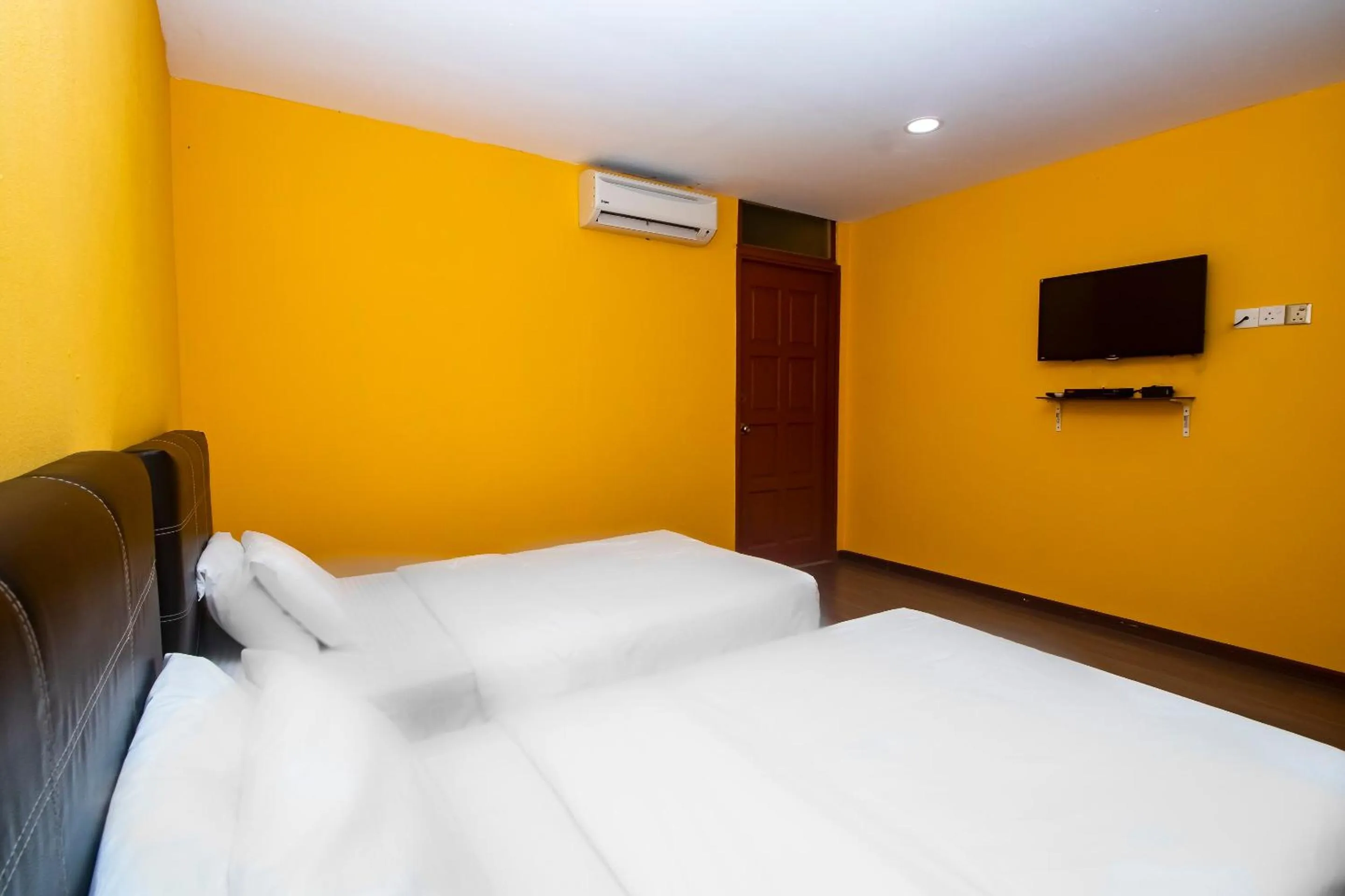 Bedroom in Hotel O Ltk Home