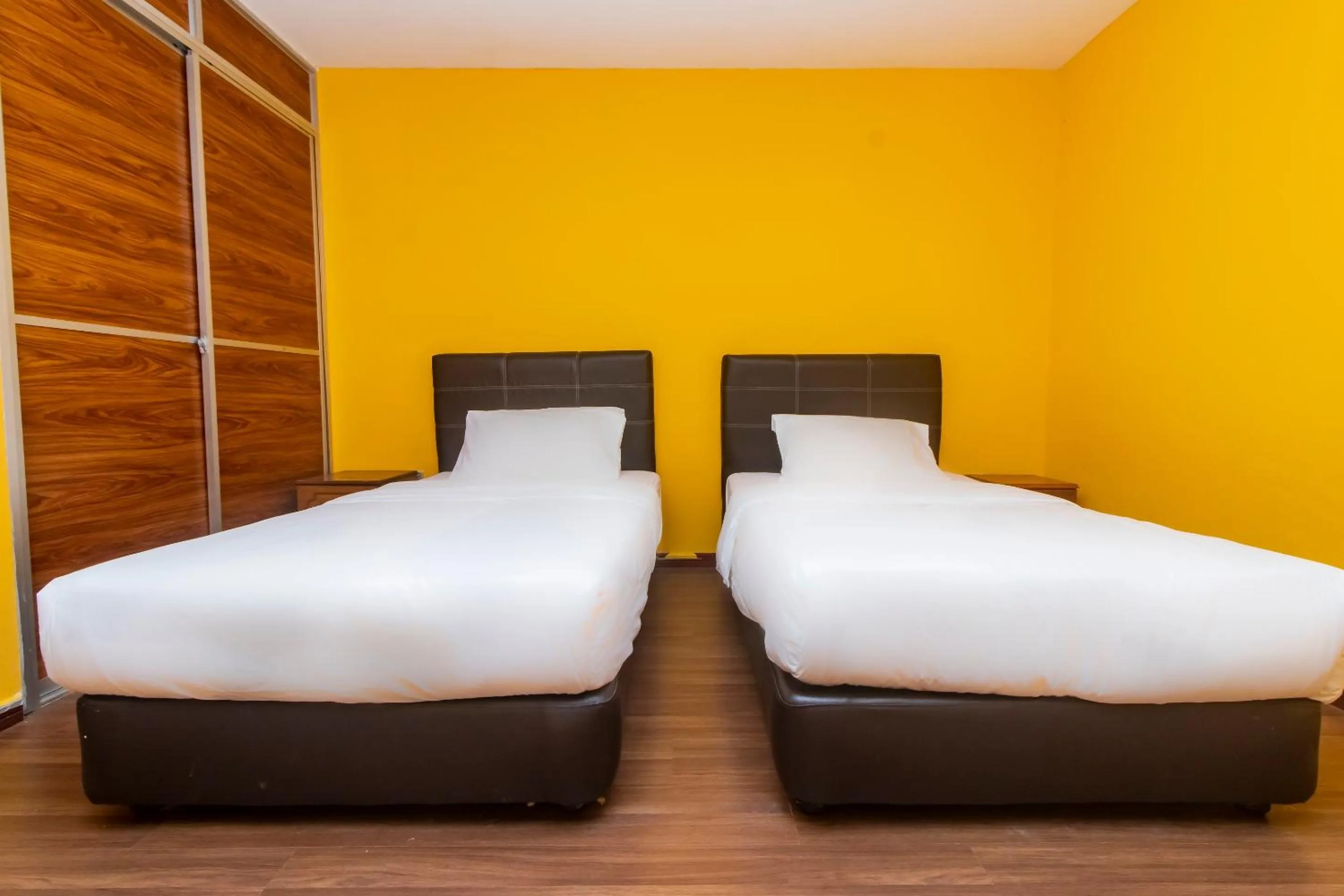 Bedroom in Hotel O Ltk Home