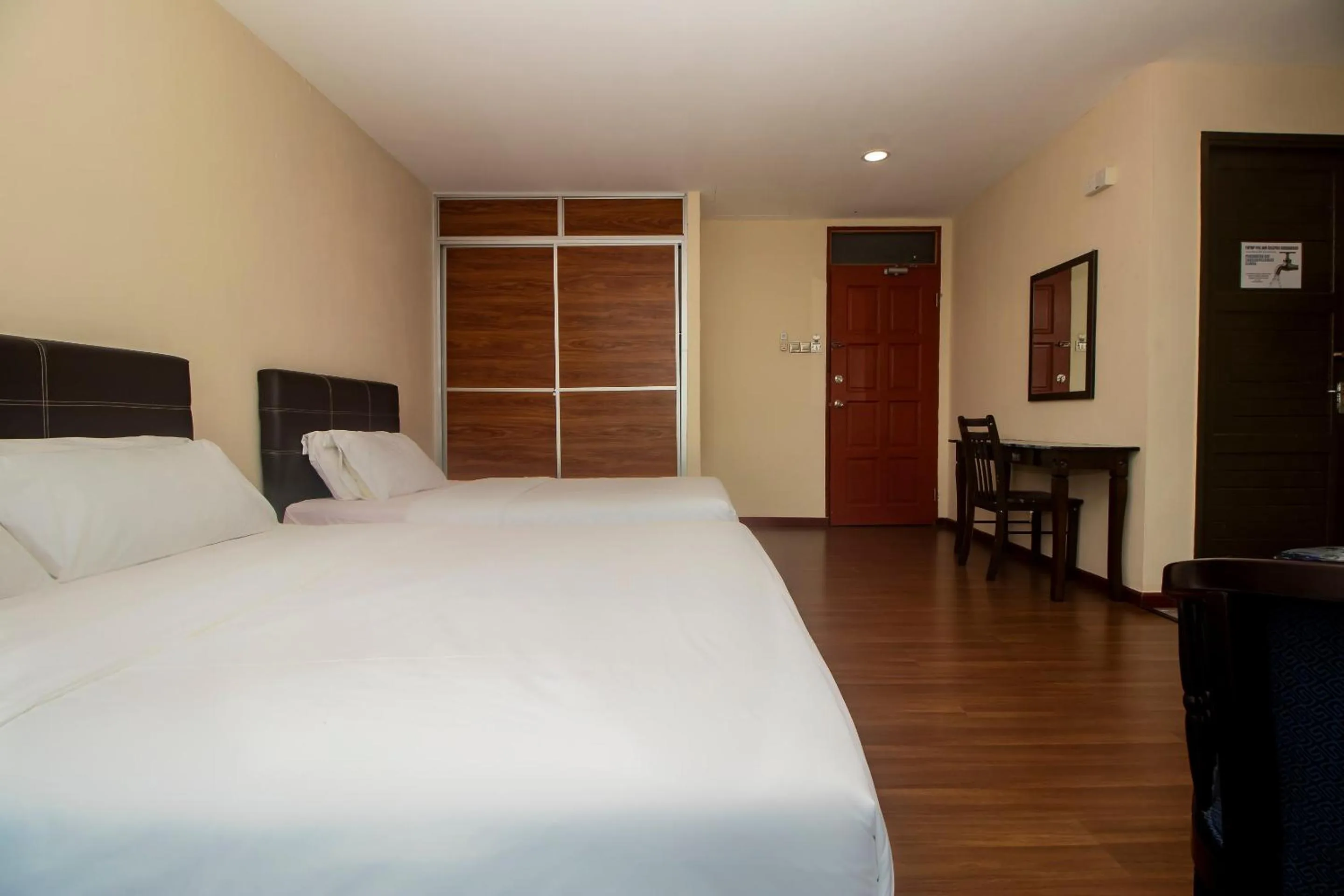 Bedroom in Hotel O Ltk Home