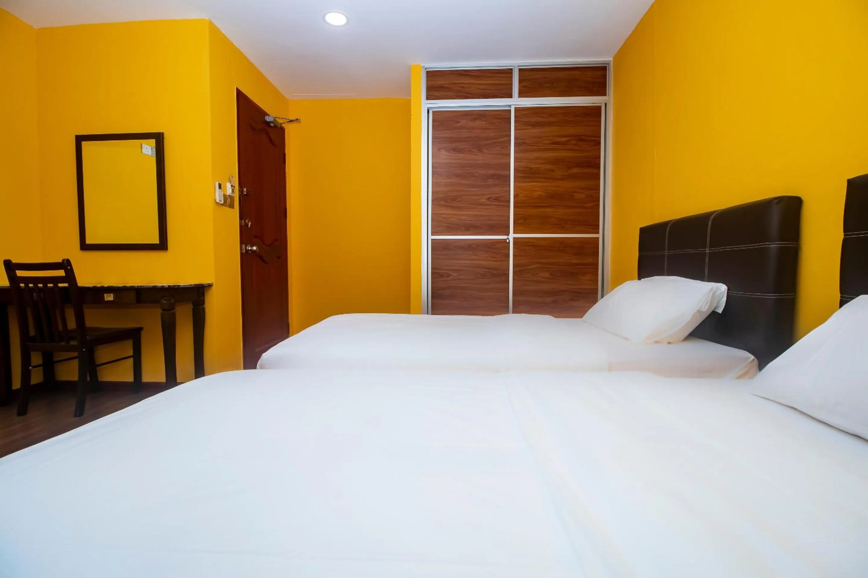Bedroom in Hotel O Ltk Home