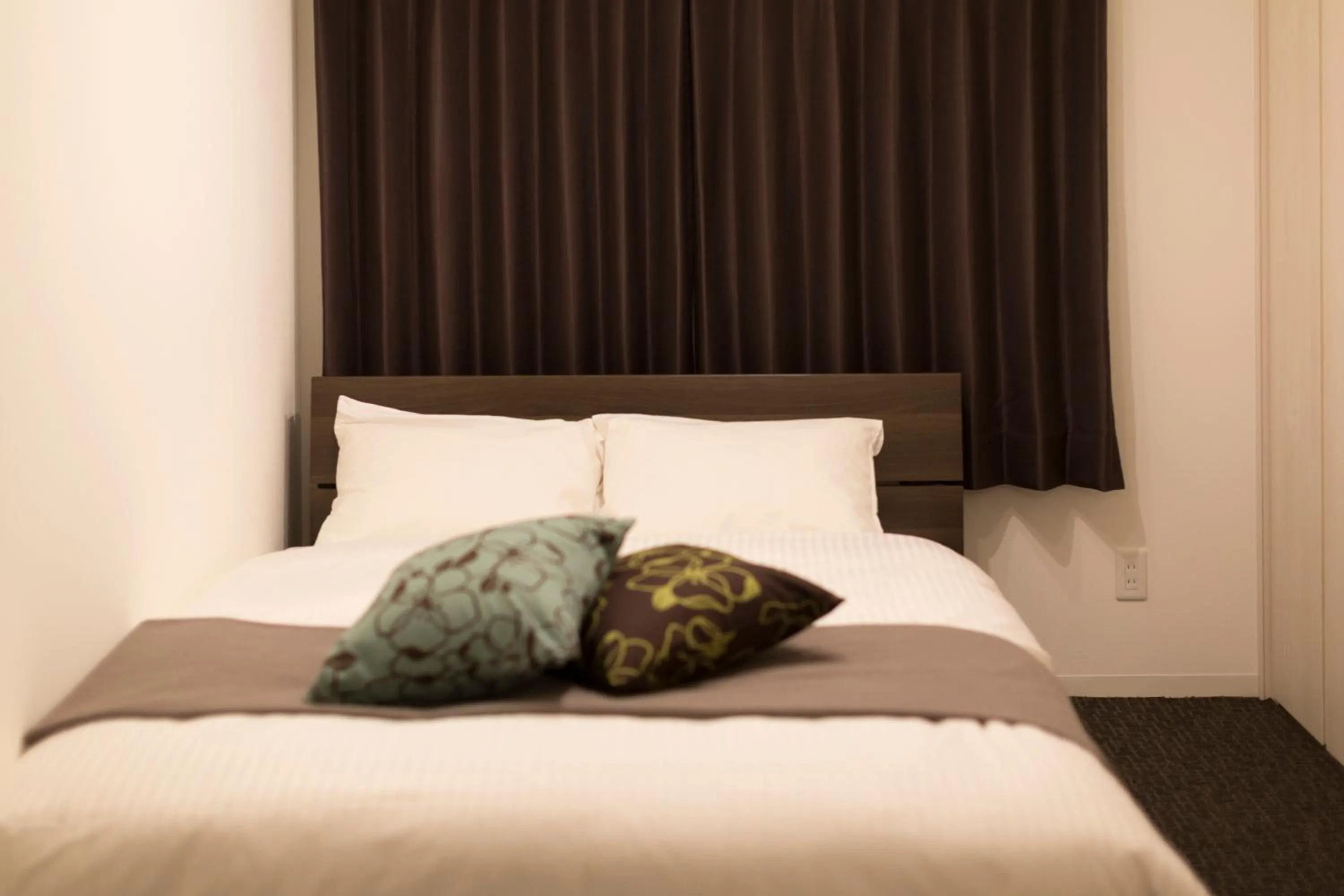 Bed in Hotel ONE'S RESIDENCE