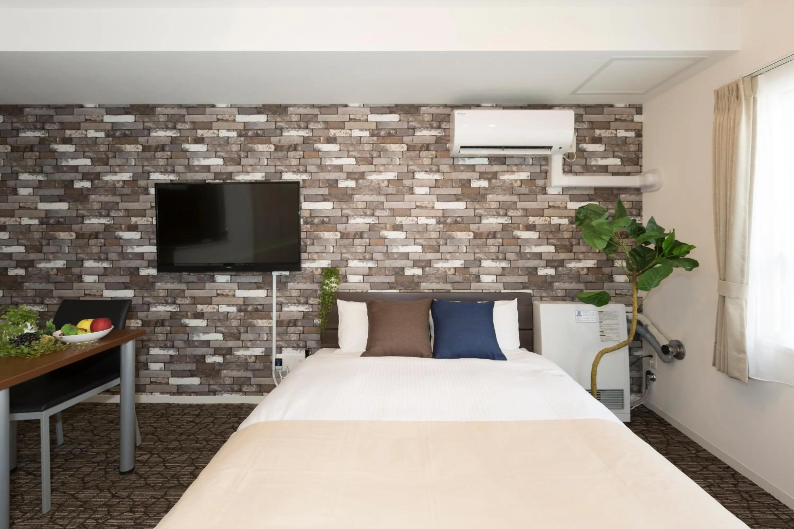 Bed in Hotel ONE'S RESIDENCE