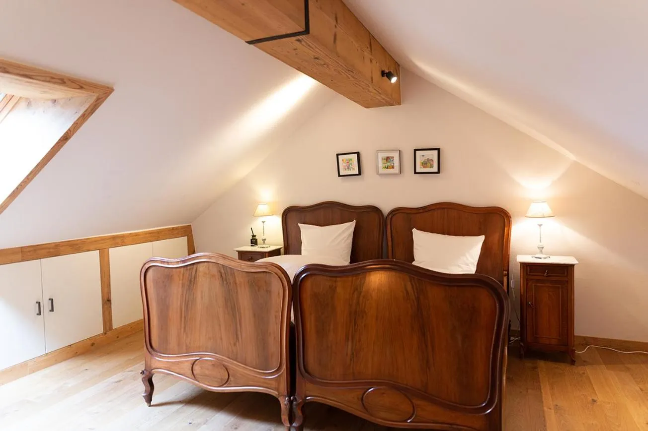 Bed in Gasthof zum Schlüssel La Méridienne Fribourg SA