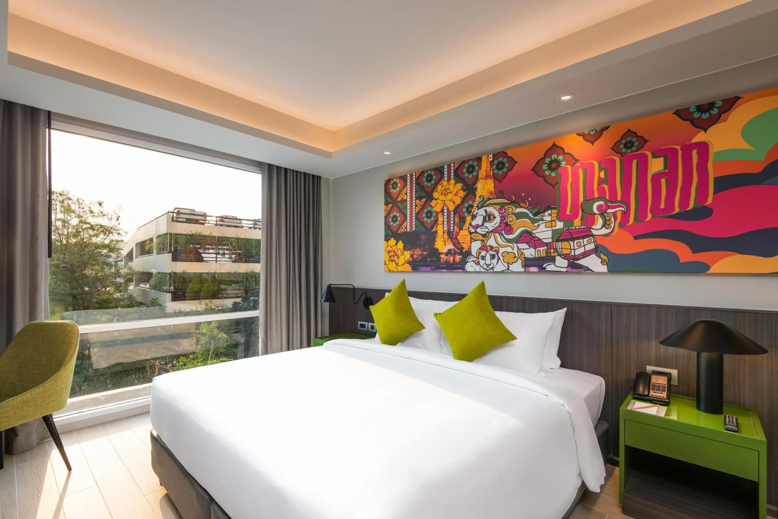 Bed in Maitria Hotel Rama 9 Bangkok - A Chatrium Collection