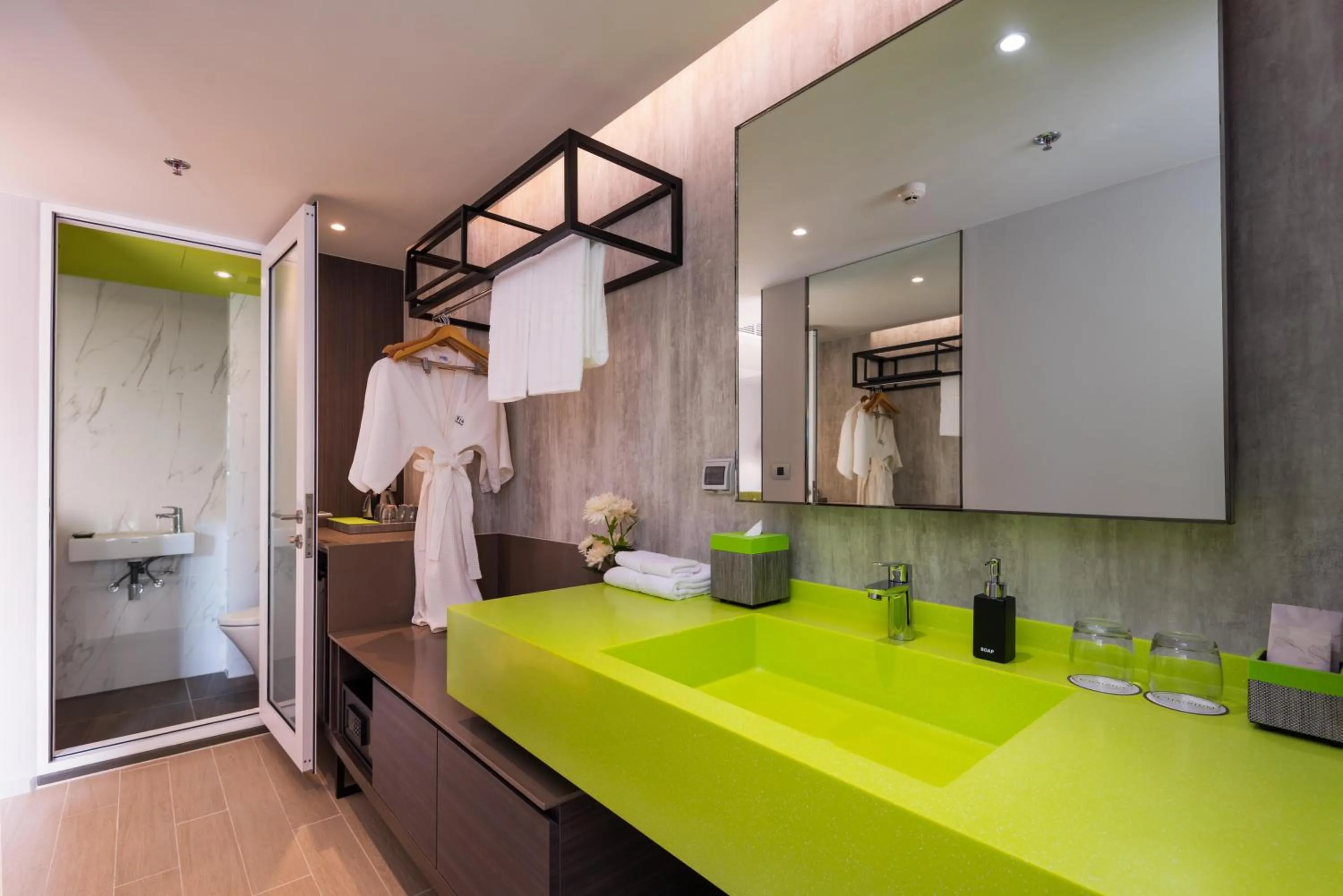 Bathroom, Bed in Maitria Hotel Rama 9 Bangkok - A Chatrium Collection