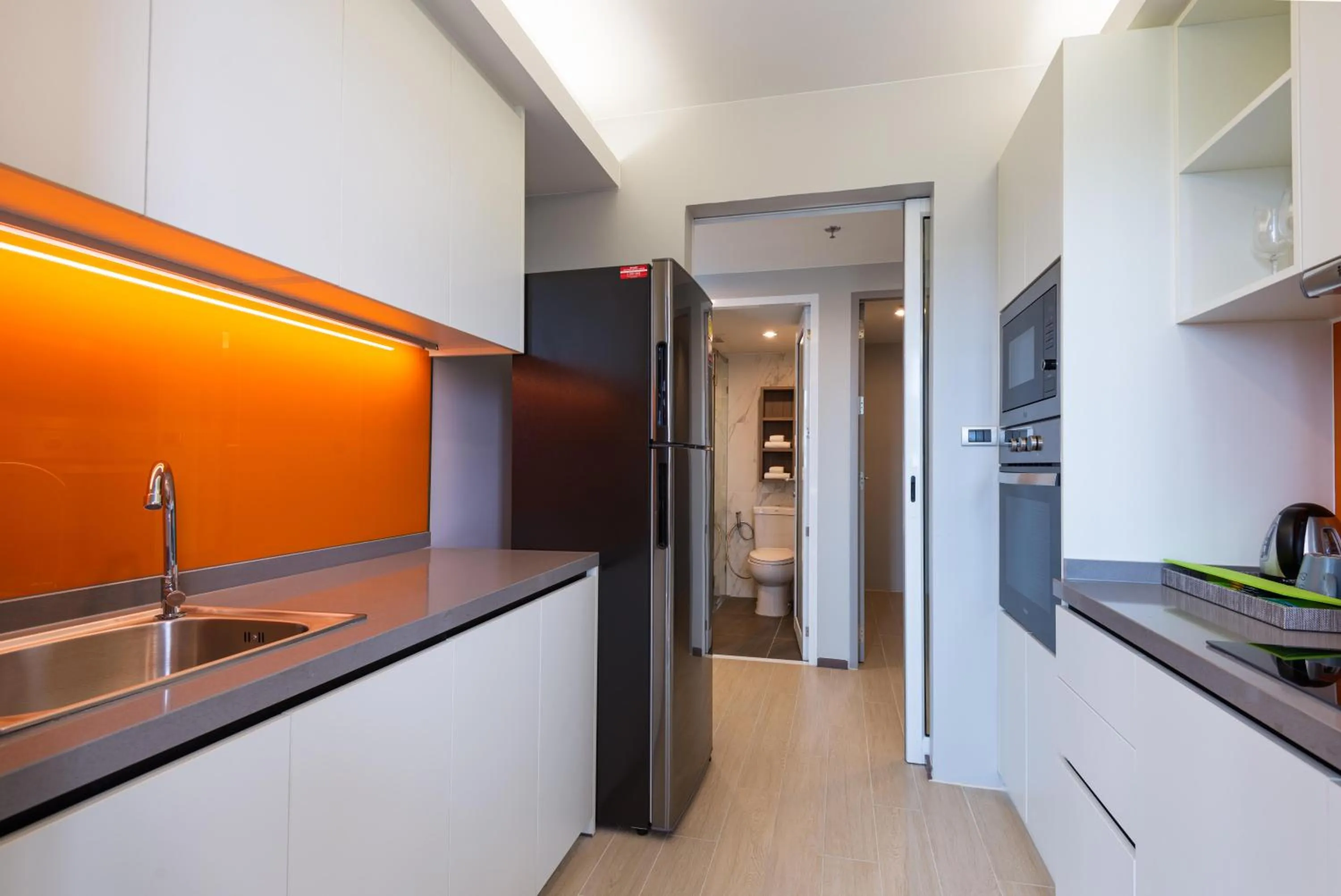 kitchen in Maitria Hotel Rama 9 Bangkok - A Chatrium Collection