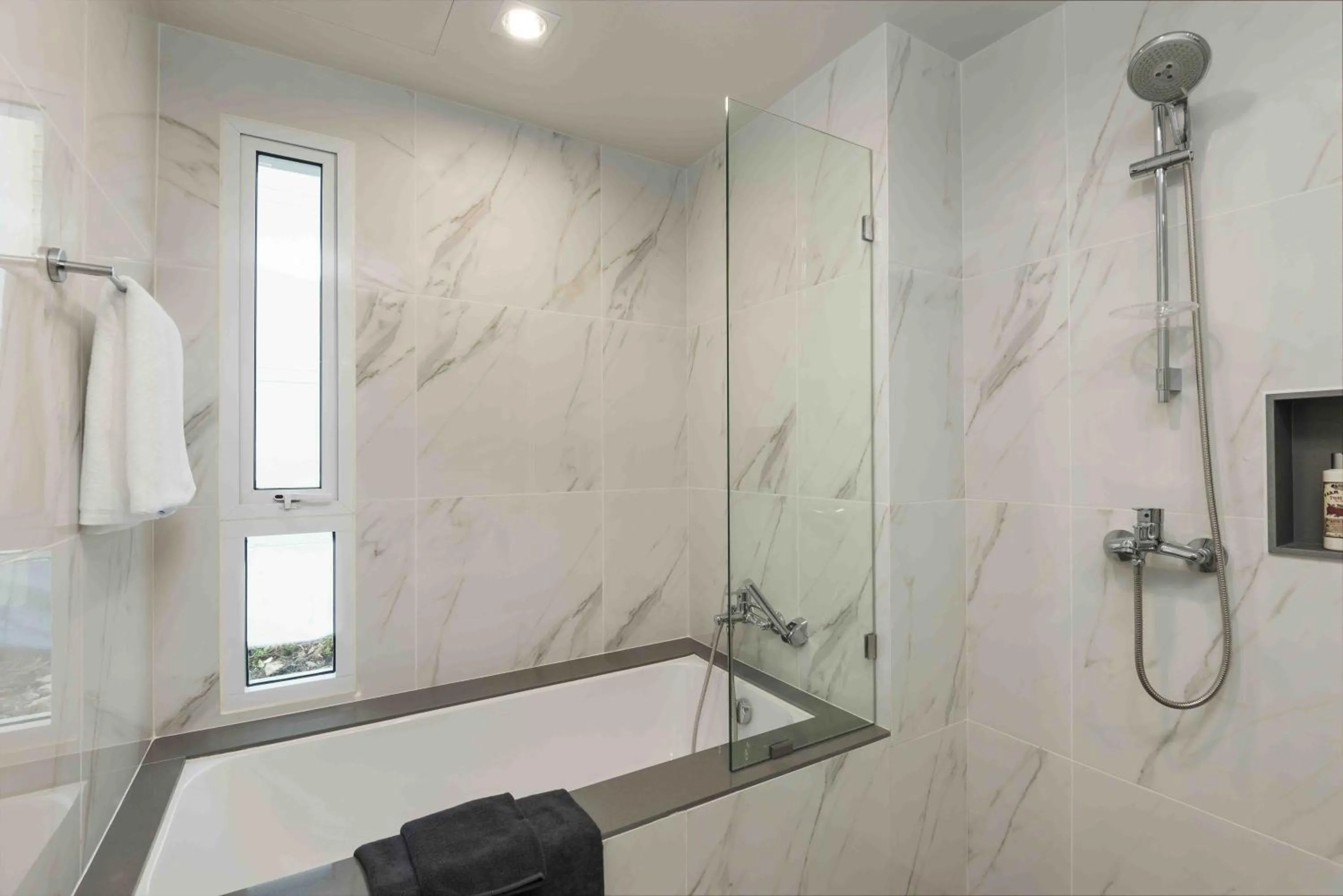 Bathroom in Maitria Hotel Rama 9 Bangkok - A Chatrium Collection