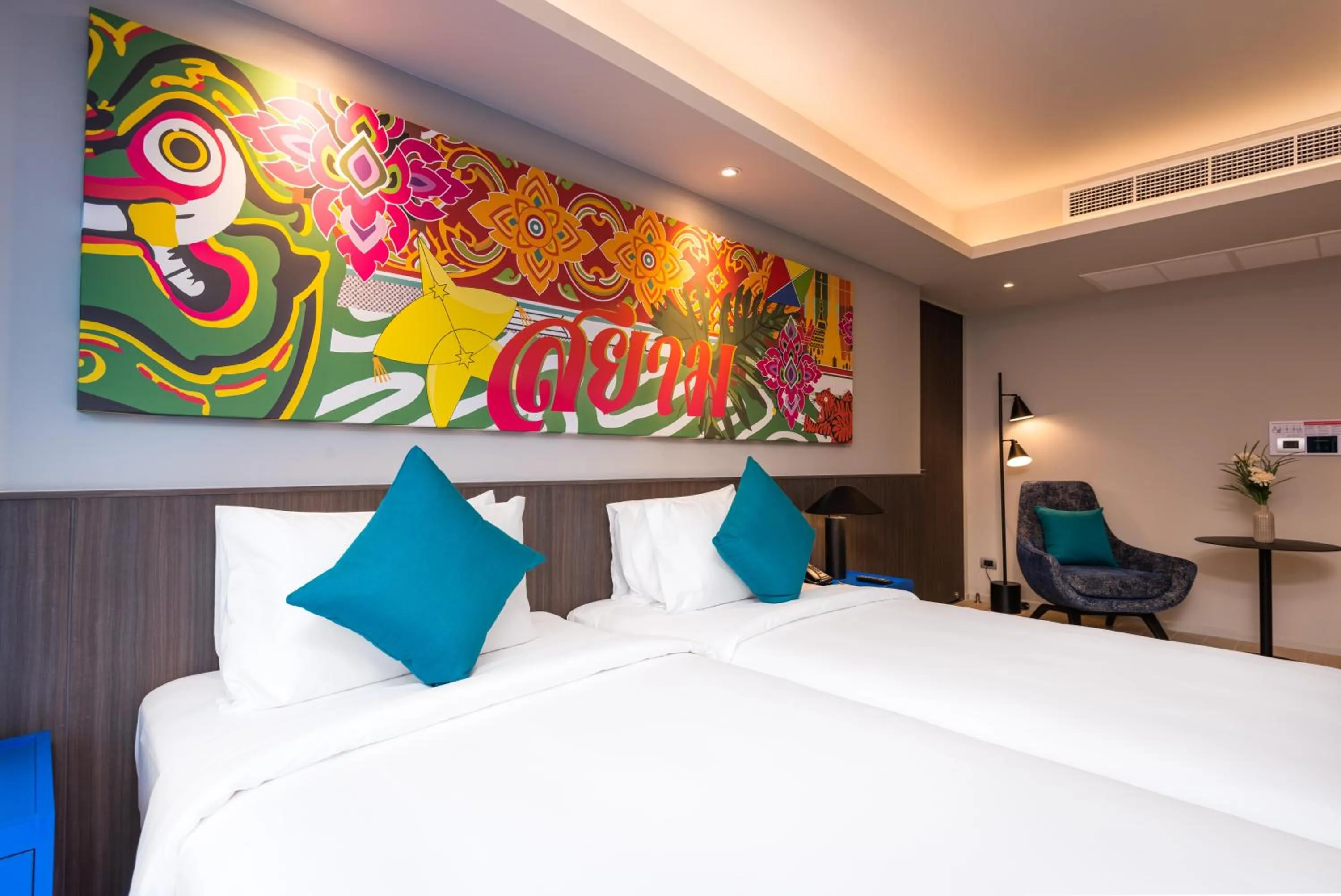 Bed in Maitria Hotel Rama 9 Bangkok - A Chatrium Collection