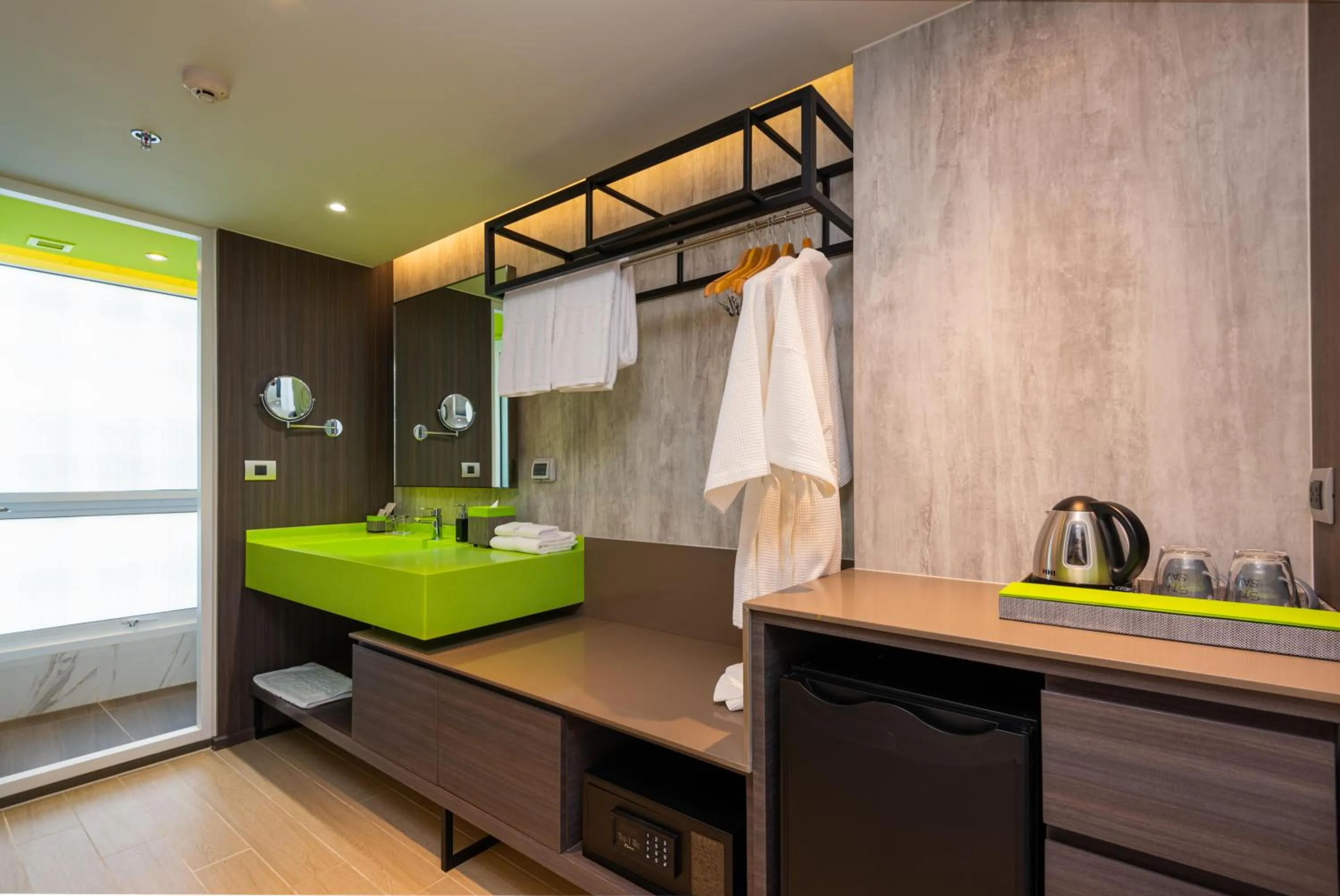 Toilet, Bed in Maitria Hotel Rama 9 Bangkok - A Chatrium Collection