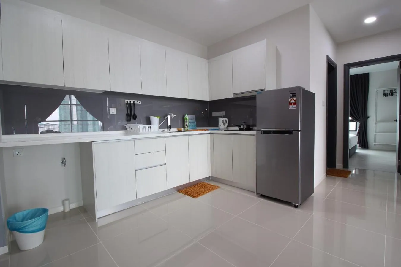 Kitchen or kitchenette in Suasana Residence by Nest Home